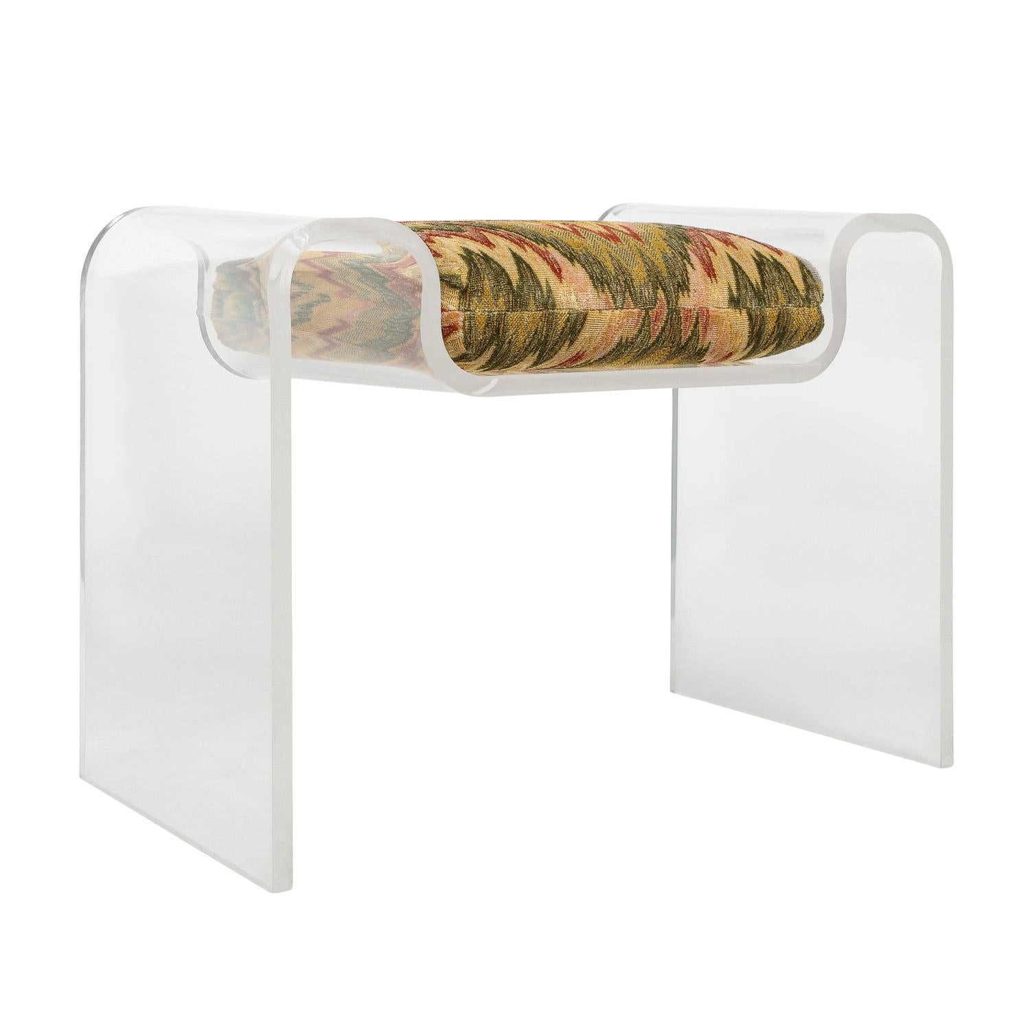 Sculptural molded lucite bench with seat cushion by Karl Springer, American 1970's. This bench is ideal for a vanity.

Reference:
Karl Springer LTD brown paper catalog published in the 1970’s, on page 54 is a photo of this model bench without the