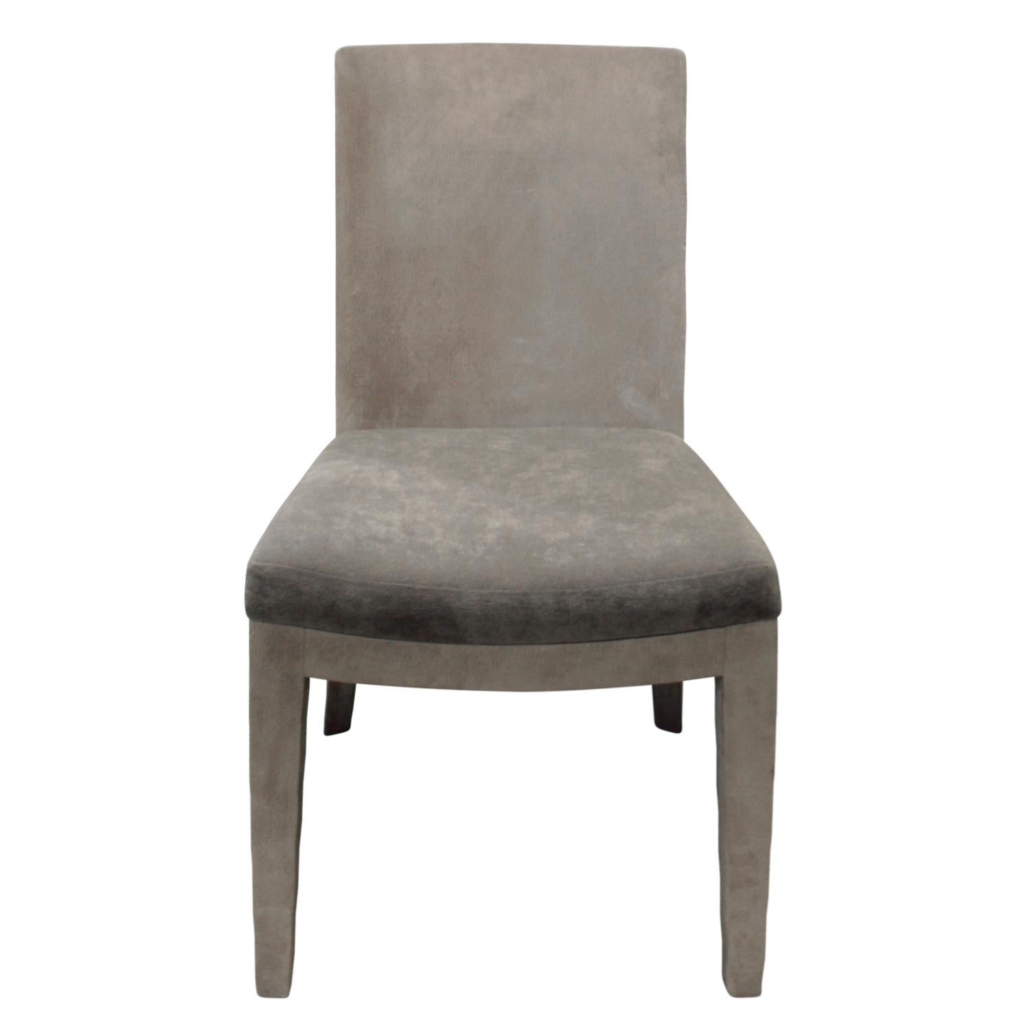 Set of 12 JMF dining chairs covered in gray ultrasuede with upholstered seats by Karl Springer, American 1970s. These chairs are chic and very comfortable.