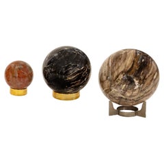 Vintage Karl Springer Set of Stunning Polished Petrified Wood Orbs on Custom Bases 1980s