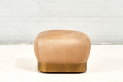 Karl Springer "Souffle" Rolling Leather and Brass Ottoman, 1980