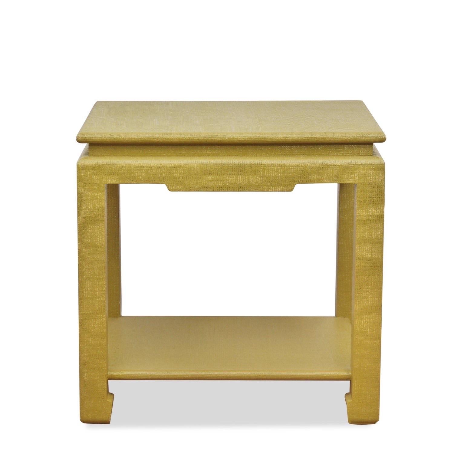 Rectangular wood end table in beige lacquered linen.  Possibly Karl Springer; unsigned.

USA, circa 1970.

Dimensions: 28”L x 24”D x 28”H

Good/pre-owned condition; some signs of vintage wear.