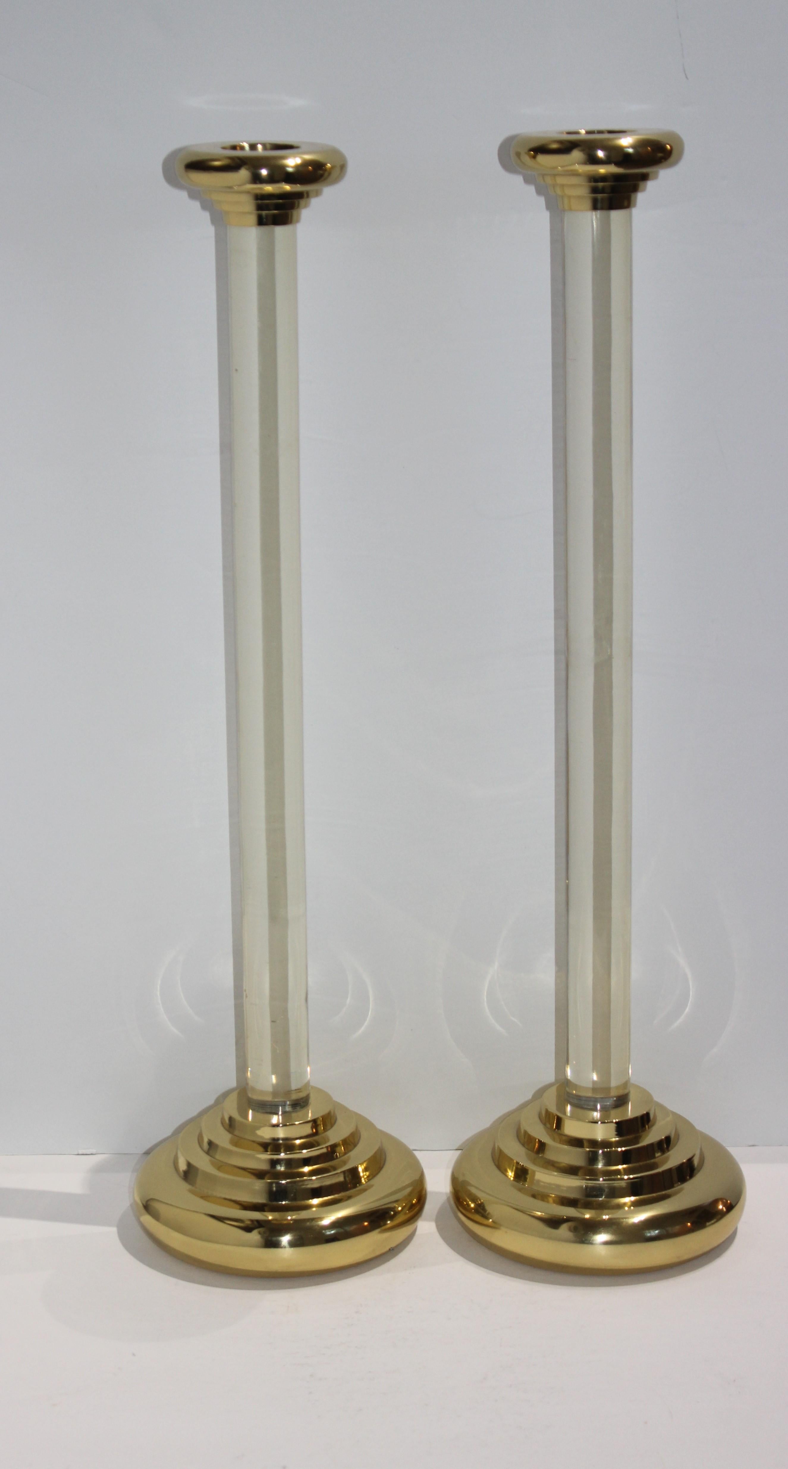 This stylish, large scale pair of candlesticks are very much in the style of pieces created by Karl Springer in the 1980s.

Note: The brass has been professionally polished and lacquered (no tarnishing).