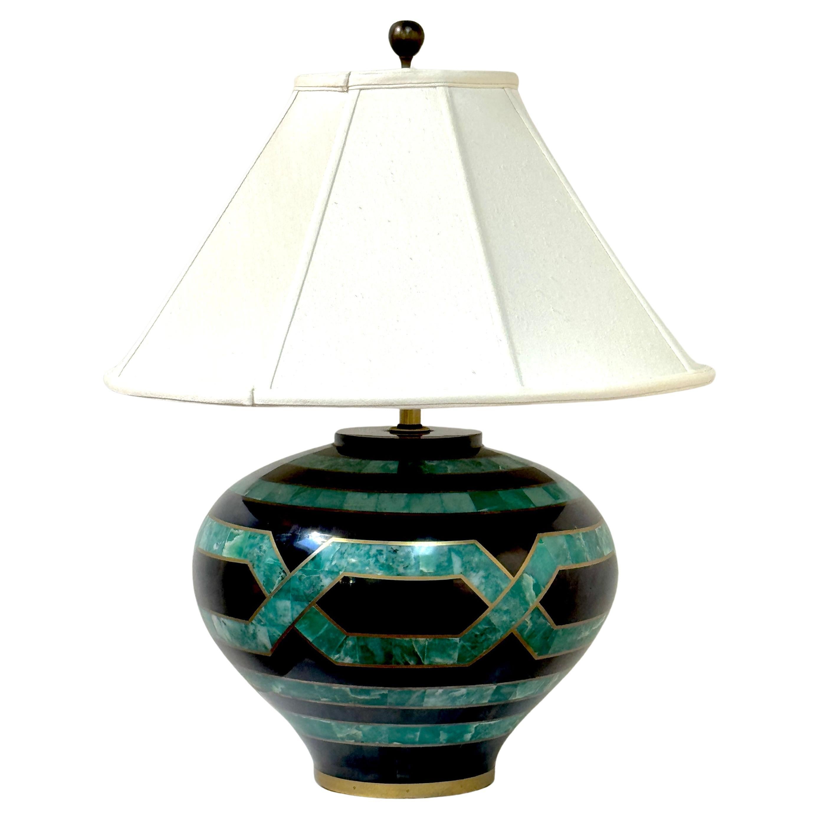 Karl Springer Style Coromandel, Malachite Lacquer, and Brass Inlaid Table Lamp 

A stunning Karl Springer-style Coromandel, Malachite Lacquer, and Brass Inlaid Table Lamp. This exquisite lamp, shaped in the form of an exaleiptron vase, features an