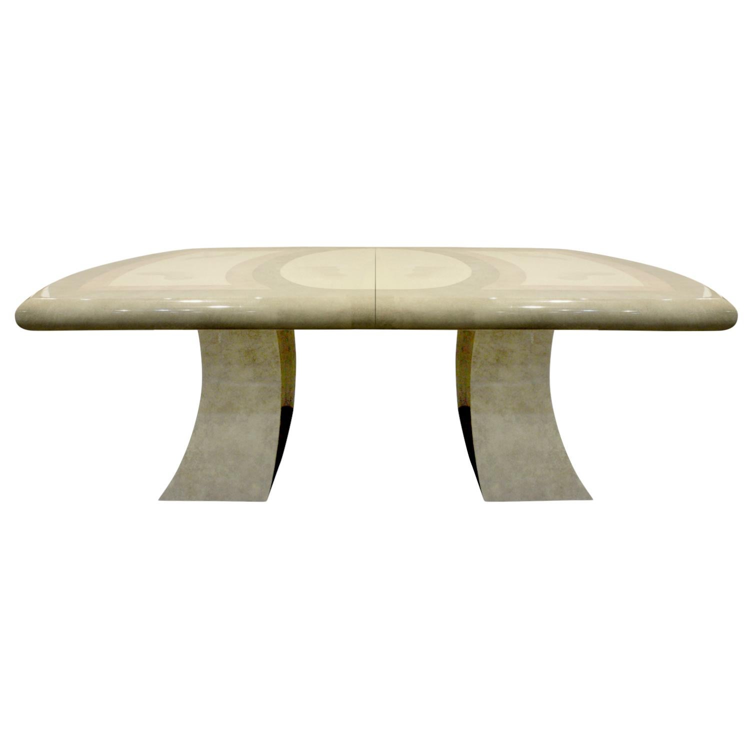 Extension dining table with artisan faux goatskin lacquer and pagoda bases in the style of Karl Springer, American, 1980s. Comes with two leaves.

Measures: With leaves: 107 inches.