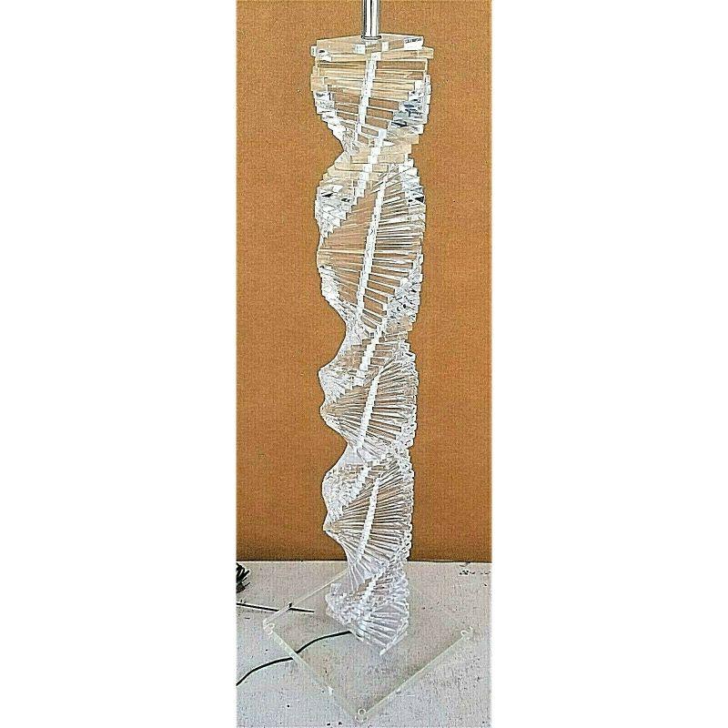 For FULL item description be sure to click on CONTINUE READING at the bottom of this listing.

Offering One Of Our Recent Palm Beach Estate Fine Lighting Acquisitions Of A
MCM 1970's Karl Springer Style Lucite Stacked Helix Spiral Staircase Floor