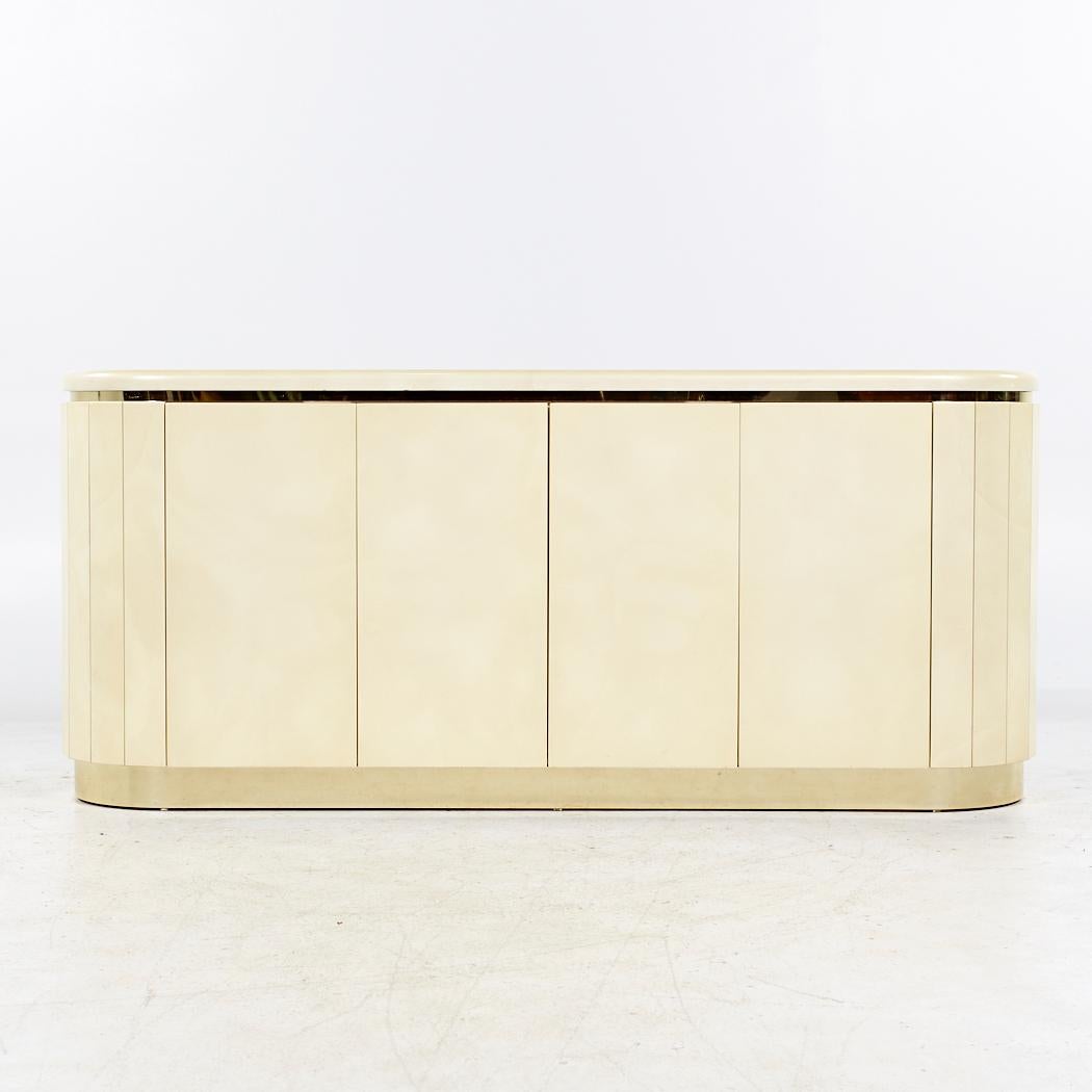 Karl Springer Style Mid Century Lacquered Goat Skin Credenza

This credenza measures: 72 wide x 18 deep x 31.5 inches high

All pieces of furniture can be had in what we call restored vintage condition. That means the piece is restored upon purchase