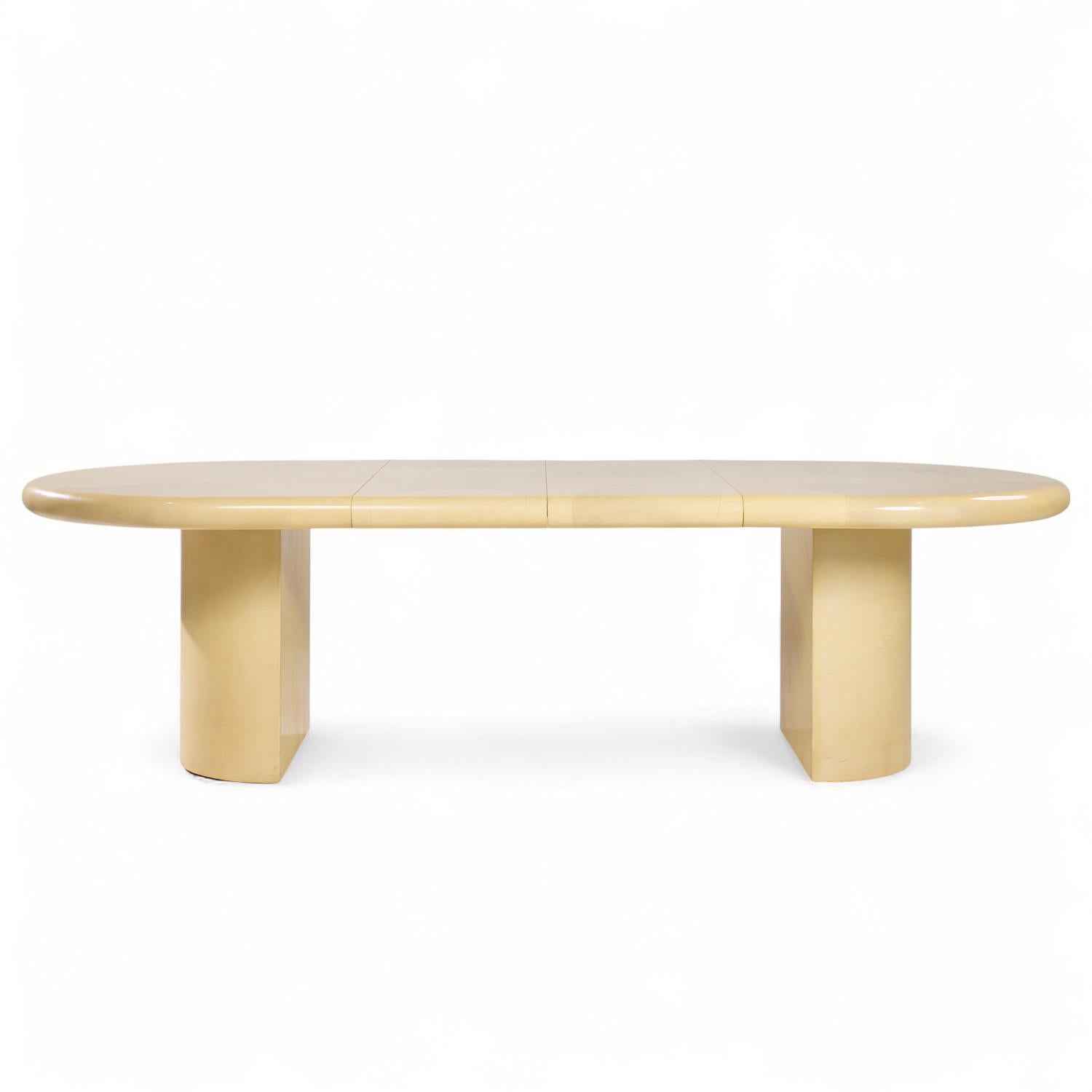 Karl Springer Style Mid Century Lacquered Goat Skin Dining Table with 2 Leaves

This table measures: 72 wide x 48 deep x 29.5 inches high, with a chair clearance of 26.5 inches, each leaf measures 18 inches wide, making a maximum table width of 108