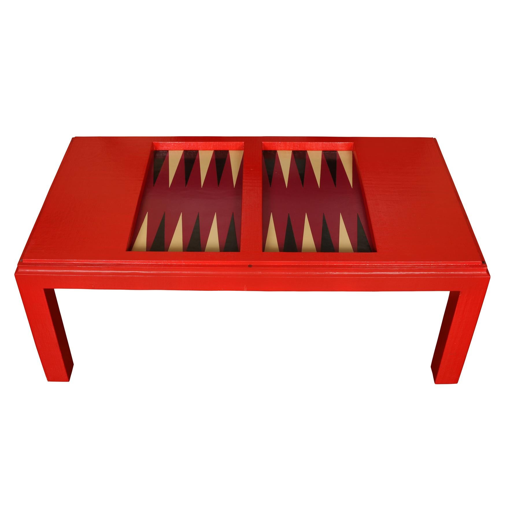 Karl Springer style backgammon coffee table in red lacquered linen with removable top and inset game board.