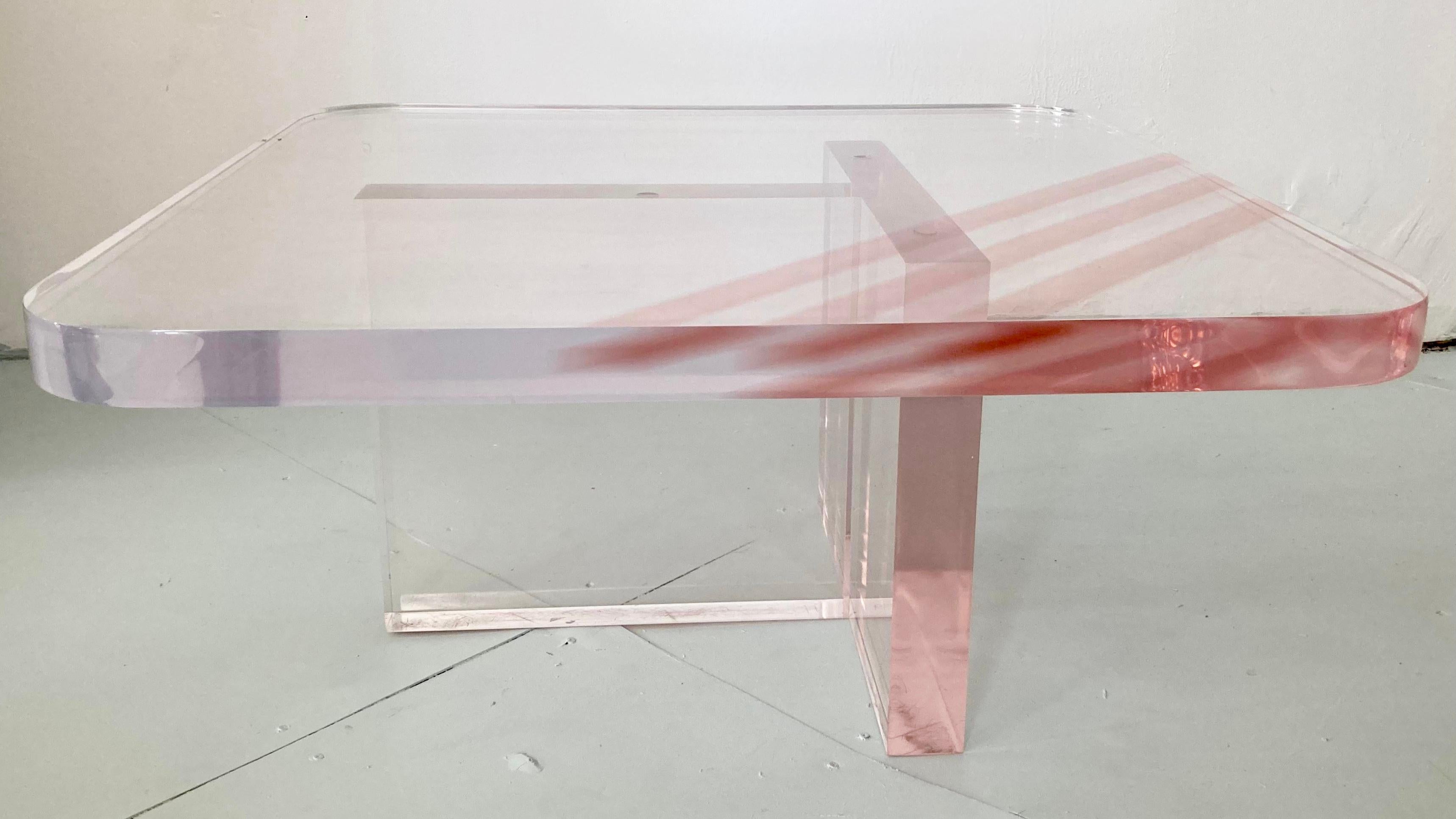 Fabulous Karl Springer rose tinted lucite coffee table. Great addition to your modern inspired interiors. This item is not marked or signed by the designer or original manufacturer.