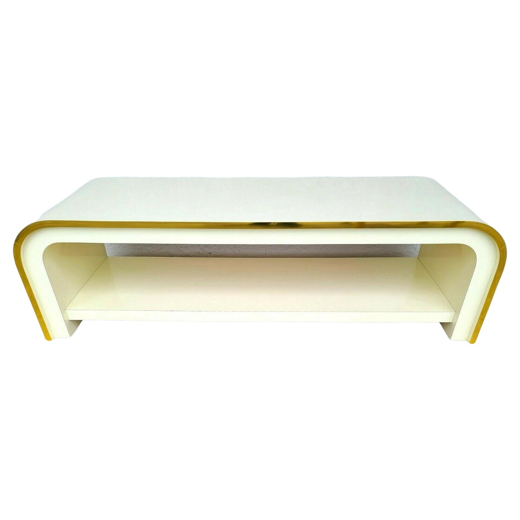 Karl Springer Style Sculptural Waterfall Laminate 
Brass Coffee Table