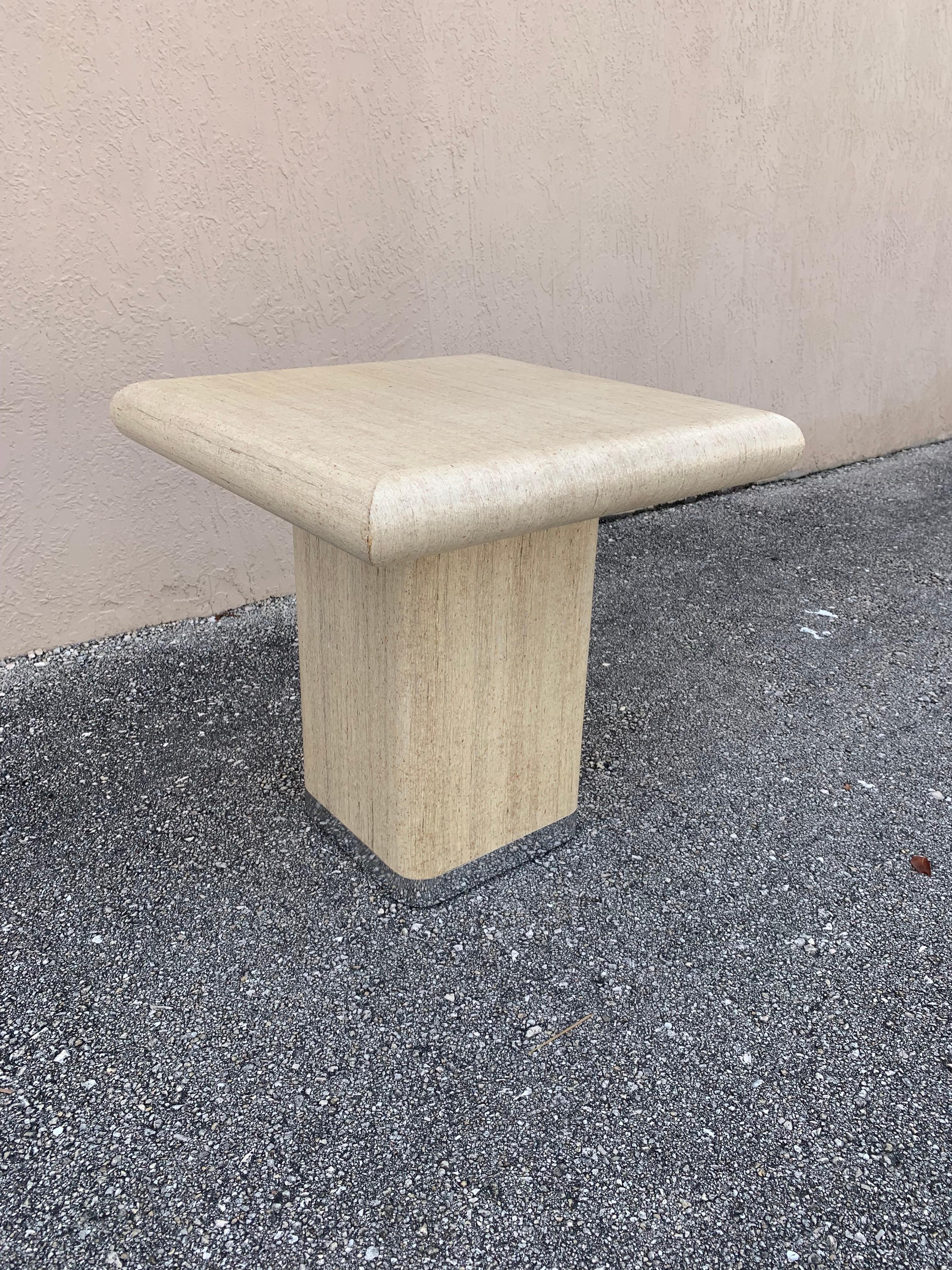 Handsome and elegant side table. Finished in Grasscloth and chrome. Boasting a polished clean neutral look.

Similar to designs of Karl Springer.

Footprint is a perfect cube at 22” tall, 22” wide and 22” deep.

Strong and solid construction and in