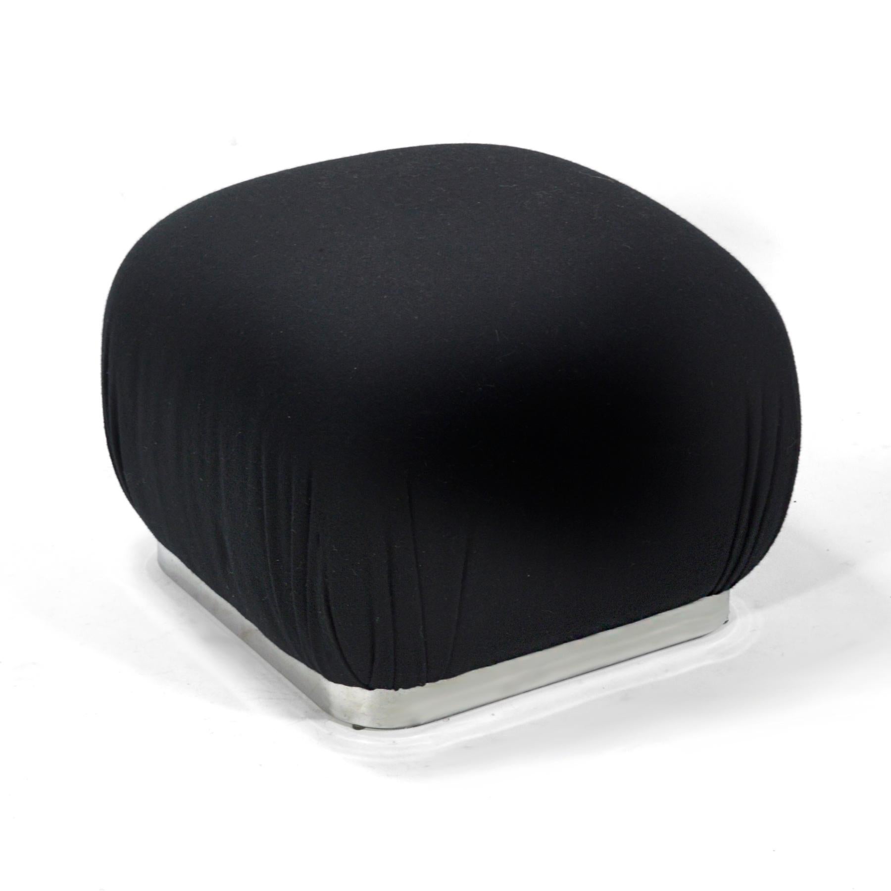 An iconic design of Karl Springer's, the souffle pouf saw many interations by different makers. This example is unmarked, but of very good quality with a chromed steel base and a nice, solid black pleated upholstery.
  