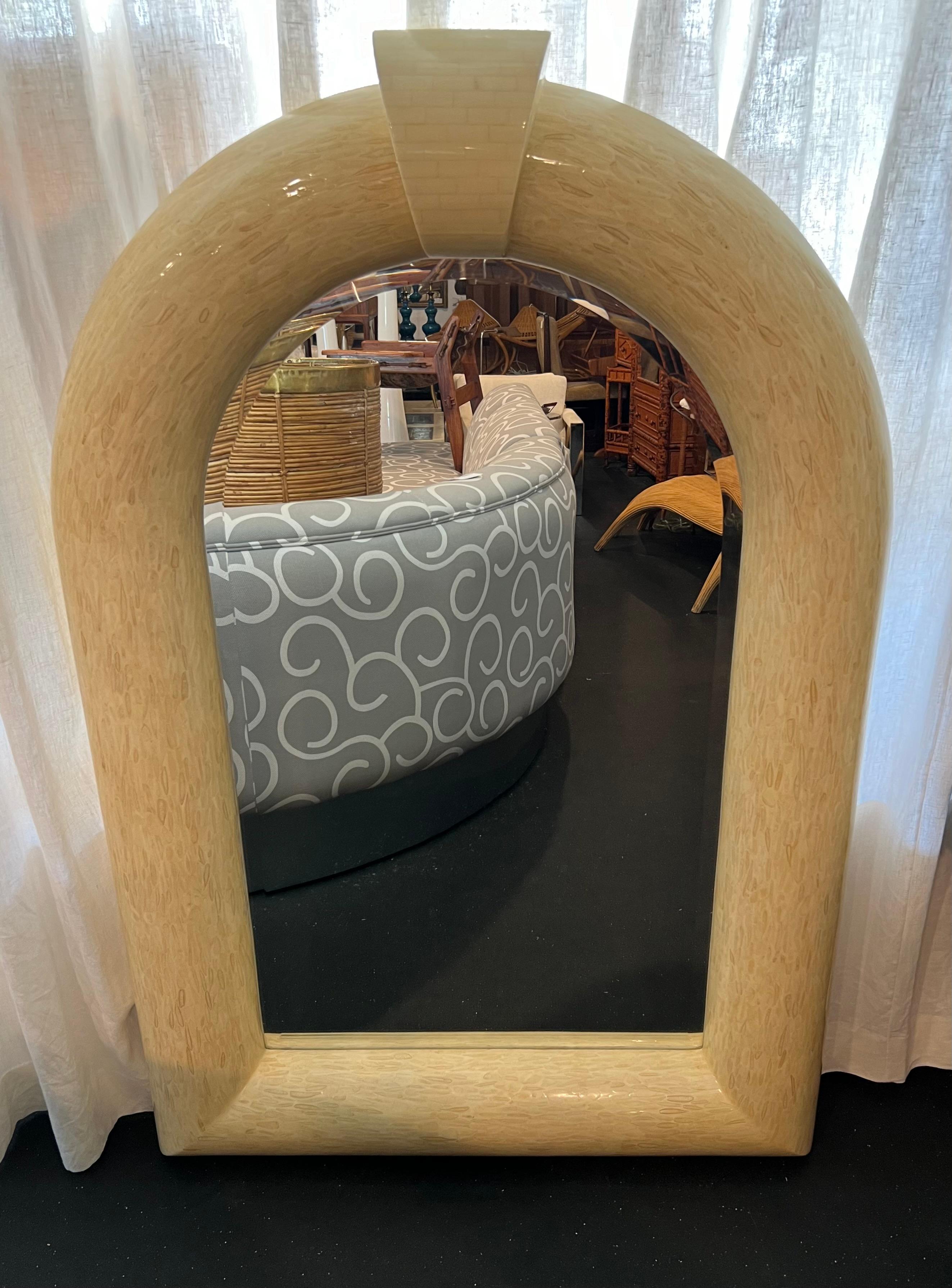 Karl Springer style tessellated antler and bone art deco wall mirror. Rare form. Additional photos available upon request.

Would work well in a variety of interiors such as modern, mid century modern, Hollywood regency, etc. Piece blends seamlessly