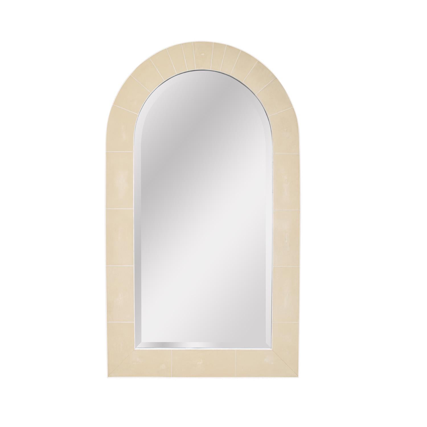 Exceptional and iconic “Dome Top Mirror” in ivory shagreen with bone inlays and outside edge in tessellated travertine with beveled mirror by Karl Springer,  American 1980's. The materials and craftsmanship of this mirror are absolutely superb.  The