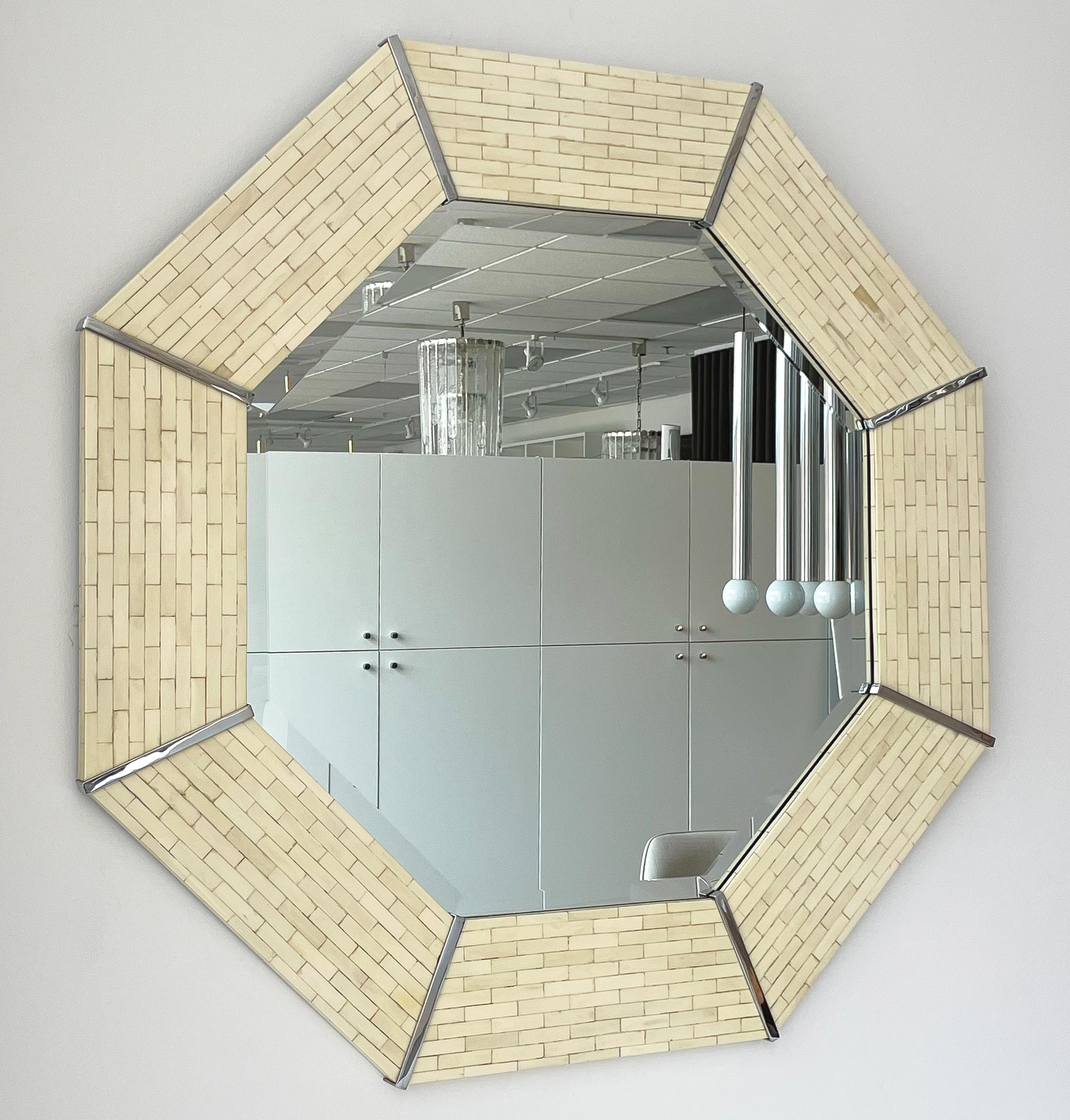 A Karl Springer tessellated bone and chrome octagon wall mirror, circa 1970s. Stylish and large this 42