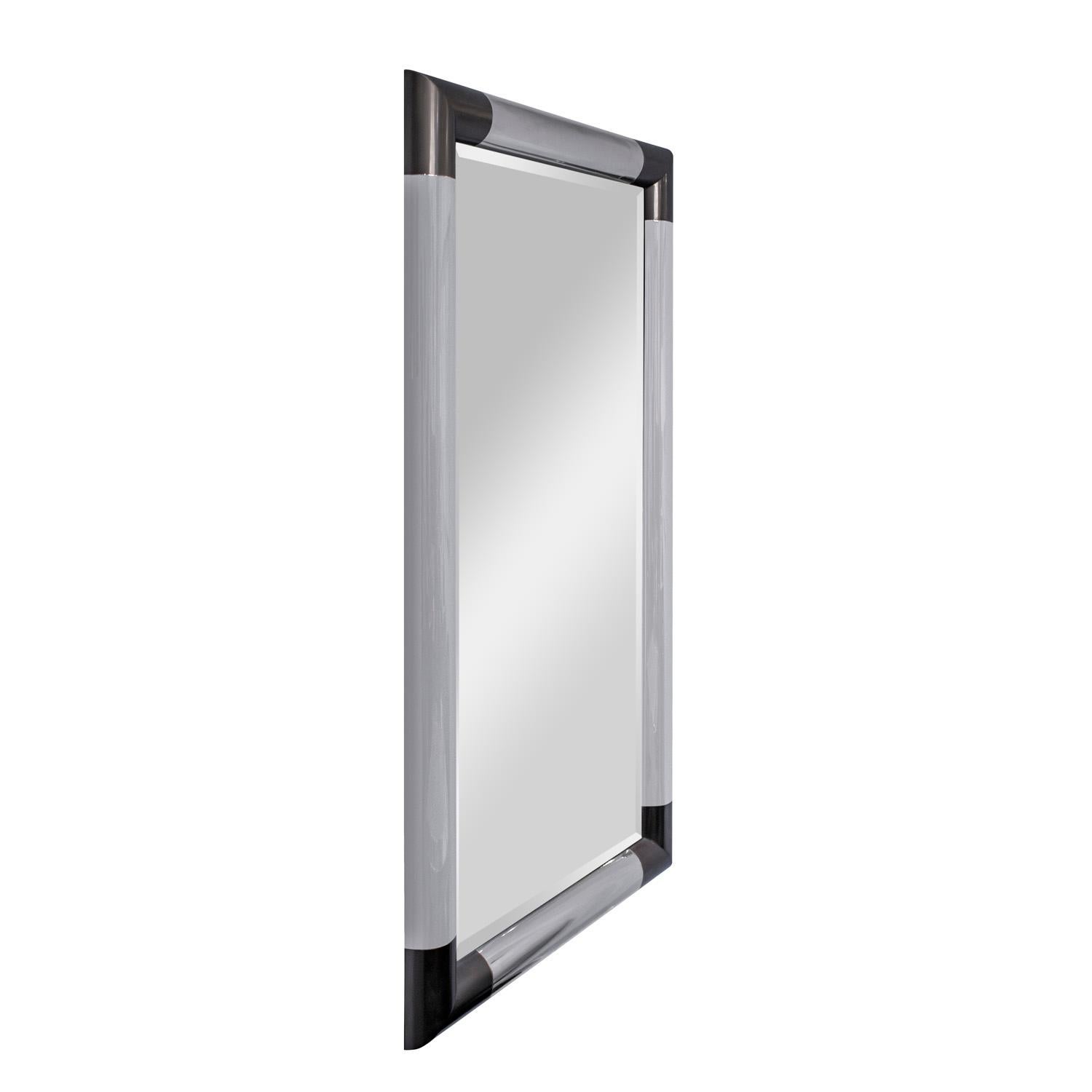 Pair of unique large wall-hanging “Half Round Metal Molding Mirrors” in polished chrome with gunmetal corners and beveled mirrors by Karl Springer, American 1980's. These mirrors were custom made for a celebrity.  The craftsmanship is