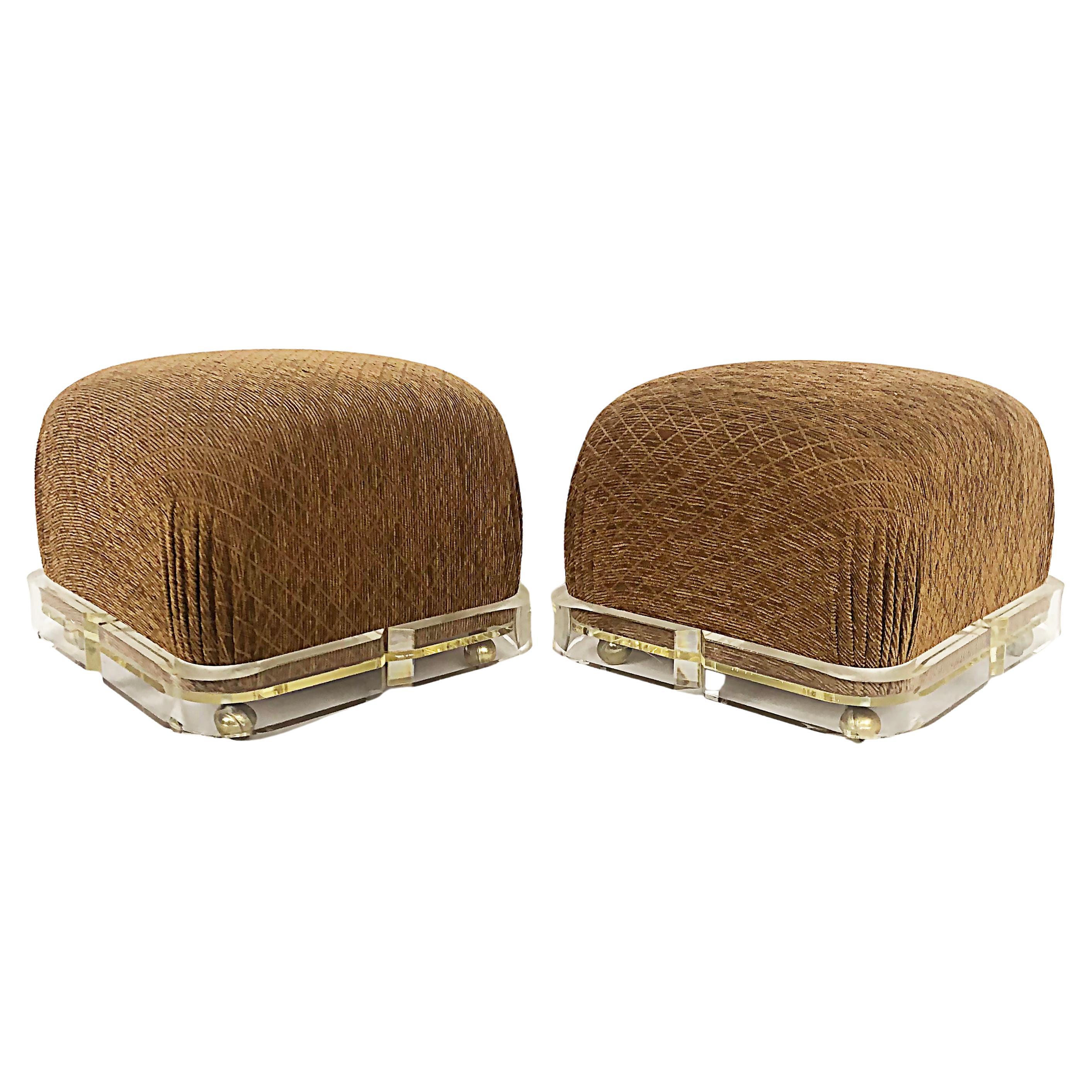 Karl Springer Upholstered Brass/ Lucite Ottoman Poufs, 1980s on Casters, a pair
