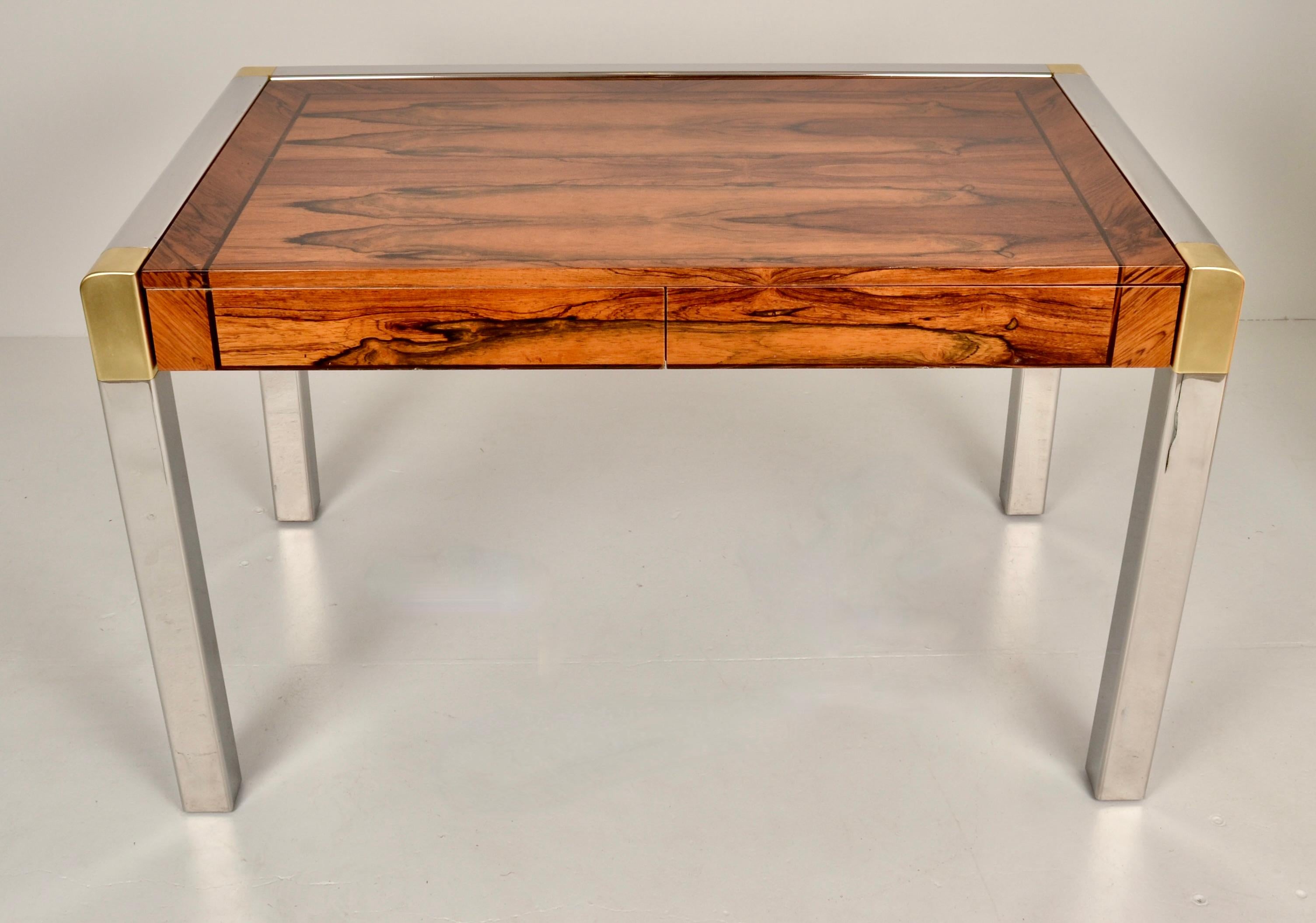 Karl Springer, rose to world acclaim in the 1970s. He created custom furniture sought by the glitterati, famously utilizing exotic and unusual materials, and superior craftsmanship. 

This desk features a high gloss lacquered zebra wood top with two