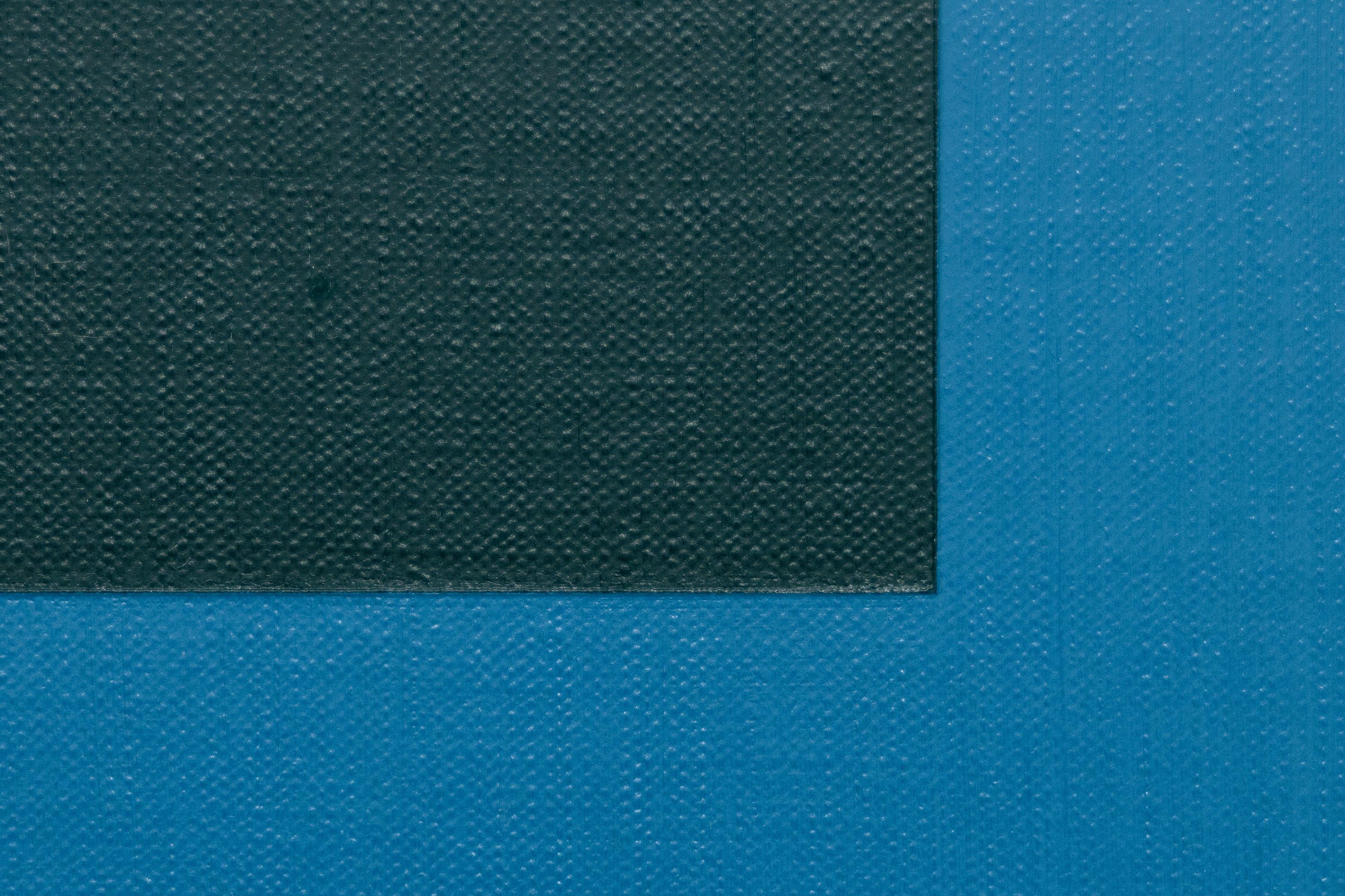 A painting by Karl Benjamin. “No. 36” is a hard edge, geometric abstract oil on canvas in a palette of dark blues and greens. The artwork is signed verso, 