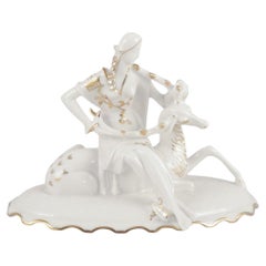 Karl Tutter for Hutschenreuther. Art Deco porcelain figurine. Woman with deer