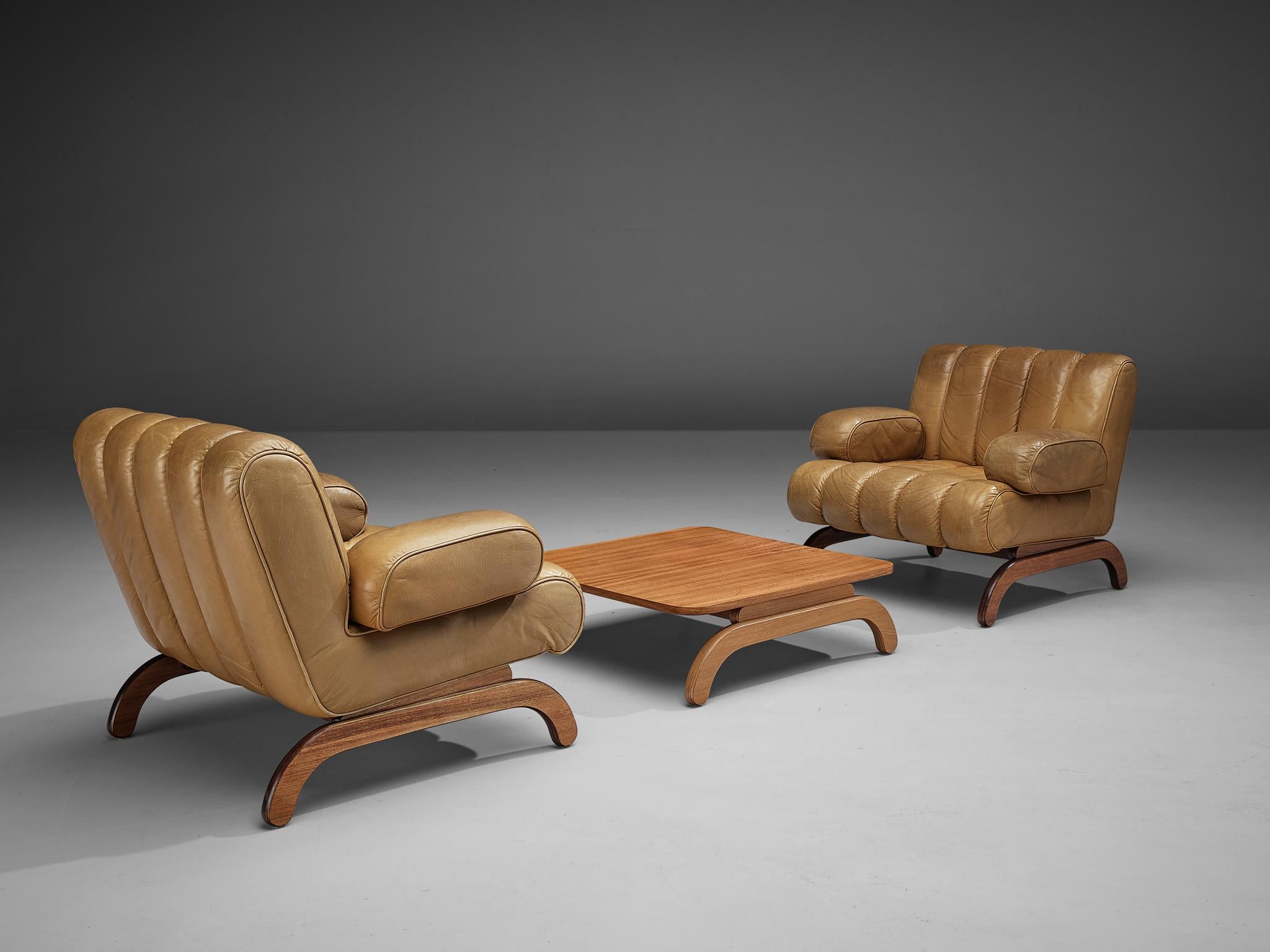 Karl Wittman for Wittmann Möbelwerkstätten, two lounge chairs, coffee table, leather, teak, Austria, designed in 1968 

This rare set of lounge chairs and coffee table is designed by the creative and talented designer Karl Wittman. The whole unit is