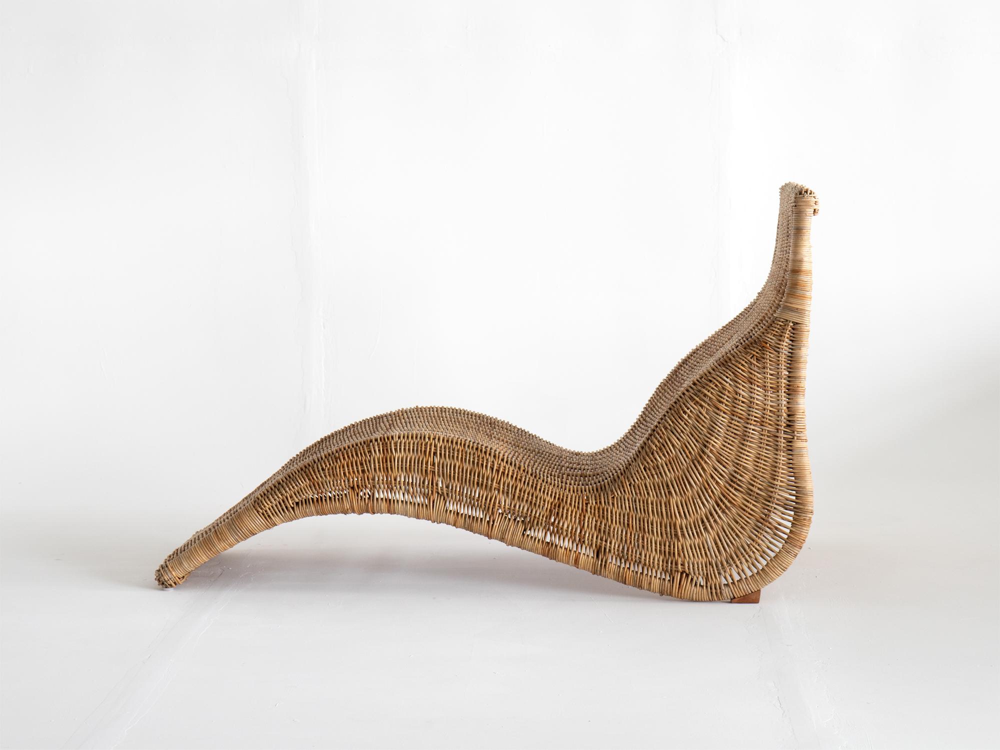 A Karlskrona lounge chair designed by Carl Öjerstam for Ikea, 1990s.

Wicker work over a bamboo frame.