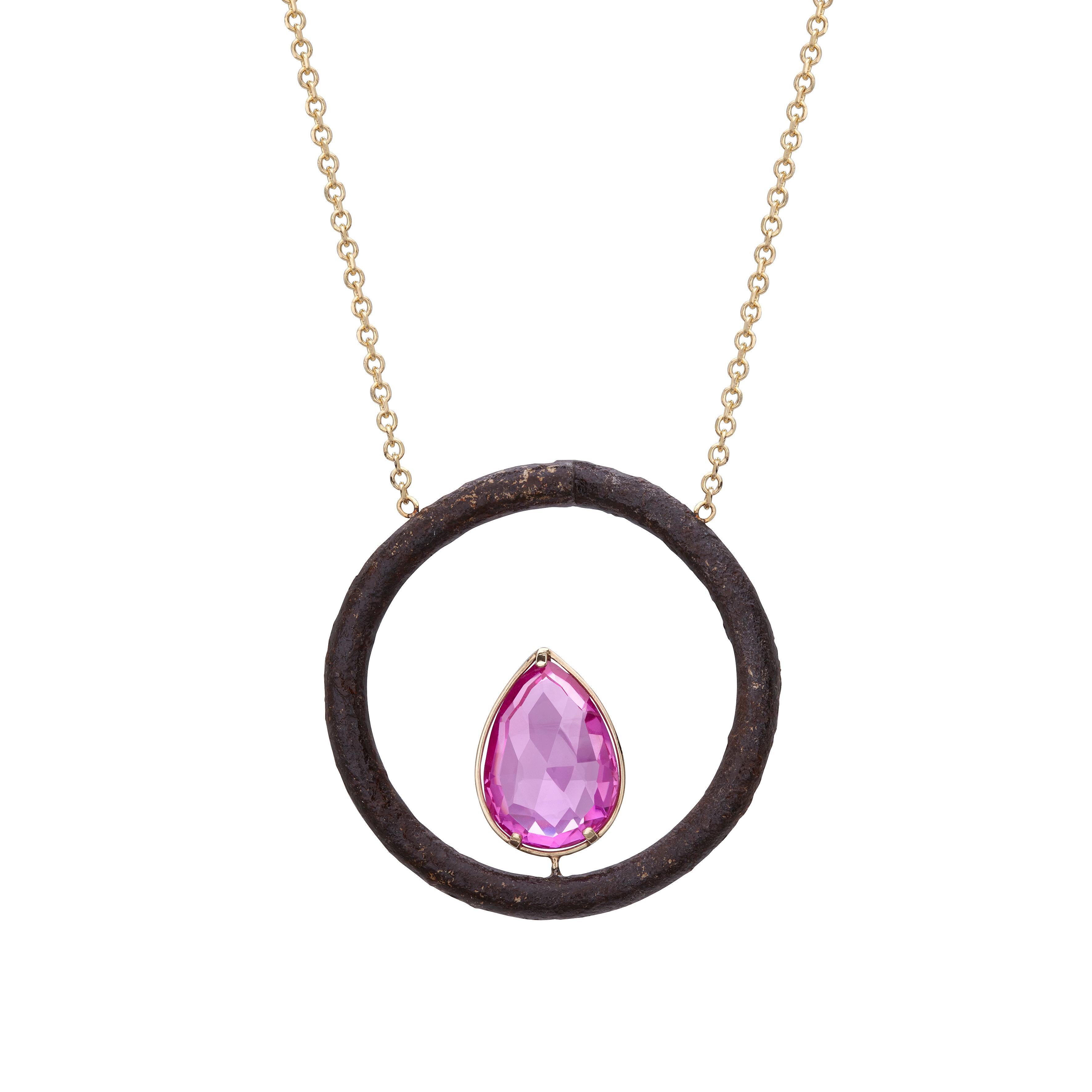 An exceptional and unique artistic pendant made of founded rusty object, old synthetic pink spinel crystal and 9Kt gold. A unique piece that will catch everyone's eye and will add a serious statement to your outfit. One-of-a-kind handcrafted