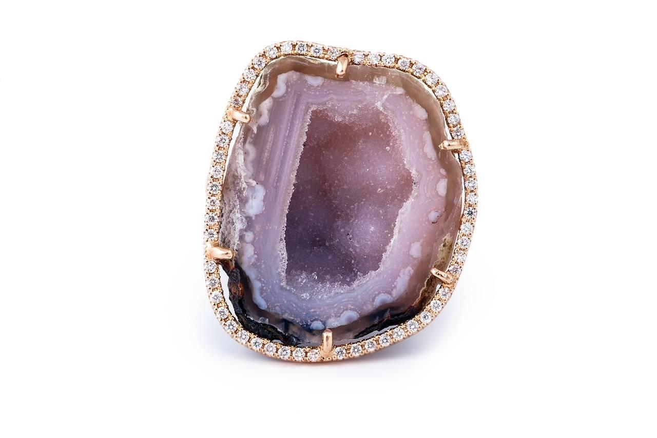 This ring is a real beauty....
Made of 18 k rose gold and set with 0,34 shimmering pavé diamonds.
The size of the center stone is perfect to be elegant but yet to make a statement!
Perfect to give or to receive!