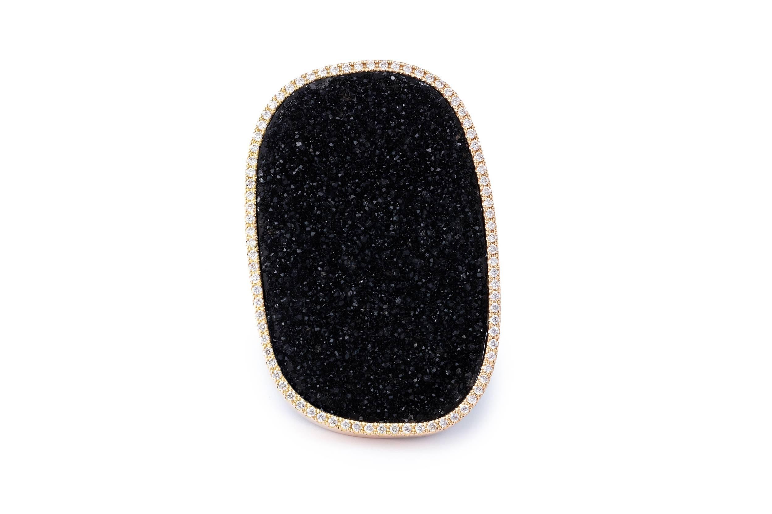 0.50 ct of shimmering diamonds, around a deep black druzy agate, that's what this stunning ring is made off.
It's a great piece to wear all day, every day.
It's the designers favorite statement piece, she wears it with Tshirt and denim during the