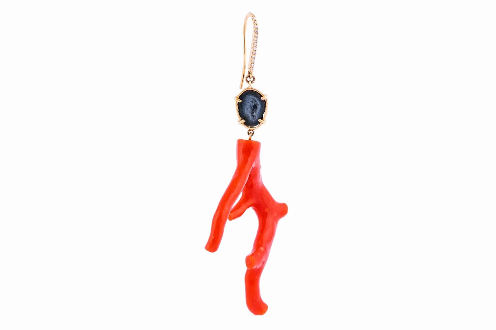 This earring comes solo.
We used real coral from Italy, combined with a small agate geode, surrounded by 18k rose gold and diamonds on the hook.