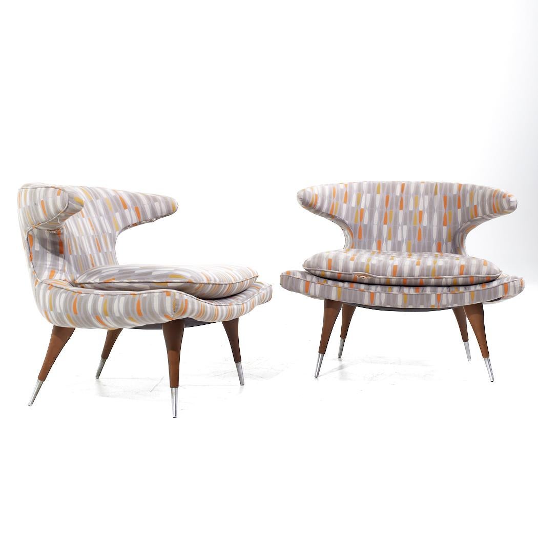 Karpen of California Mid Century Horn Chairs - Pair

Each lounge chair measures: 34 wide x 28 deep x 28 high, with a seat height of 17 and arm height/chair clearance 26.75 inches

All pieces of furniture can be had in what we call restored vintage