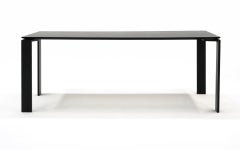 Mesa de comedor/trabajo Kartel de la colección Four. Laminado negro y acero