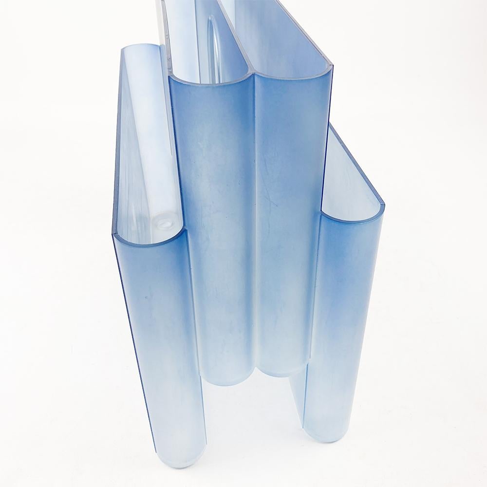 Kartell 4676 magazine rack designed by Giotto Stoppino in 1971. For