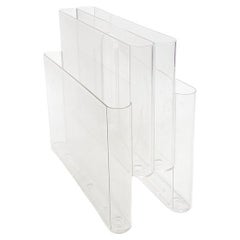 Portariviste Kartell 4676 disegnato da Giotto Stoppino nel 1971.