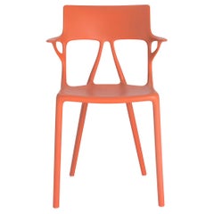 2er-Set Kartell AI-Stuhl in Orange, entworfen von artificial Intelligence
