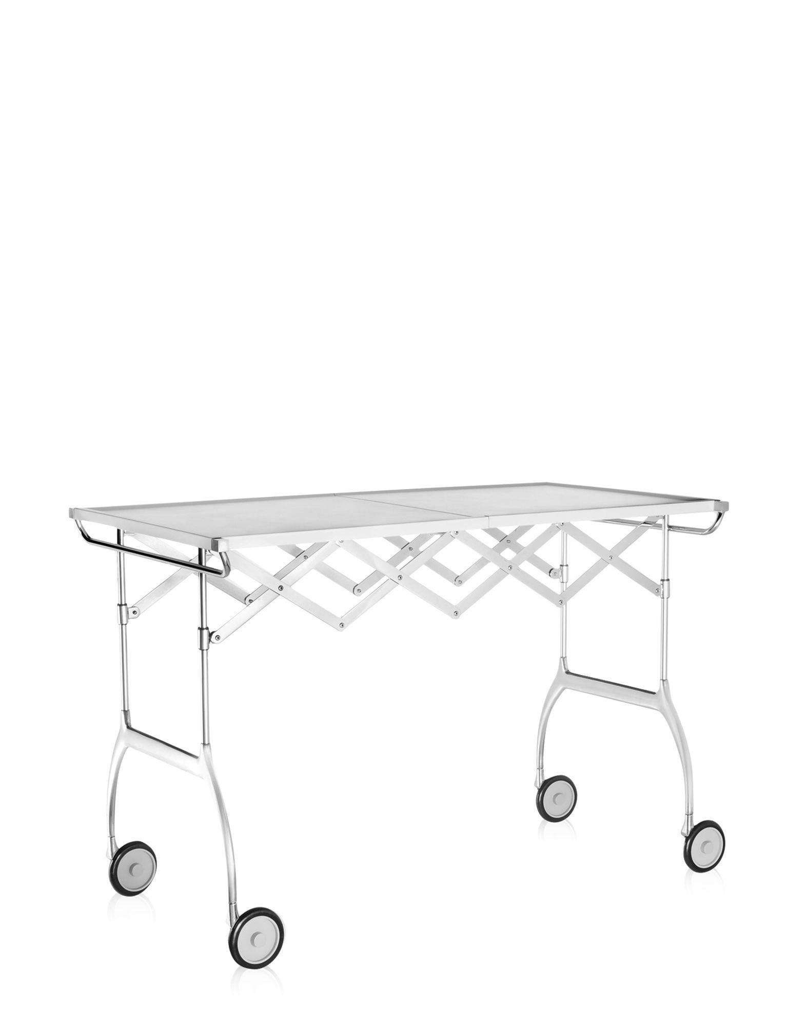 Besides being a practical trolley with a striking combination of plastic and metal components, Battista is an all-out extendible and folding table, ideal for buffets and aperitifs or as a small single table.

Dimensions: Height: 21.25 in.; Width: