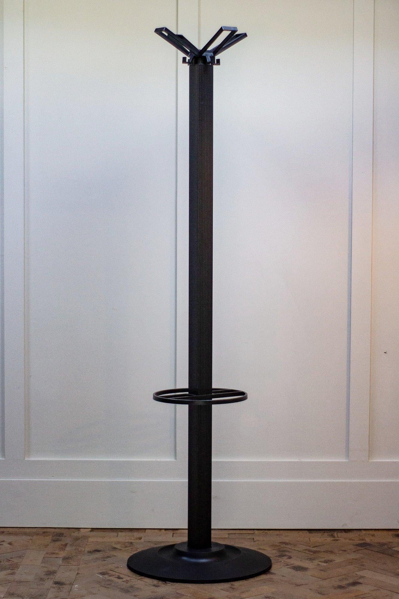 Italian coat stand by Kartell. Made of black plastic in the late 1980s. A real standout piece of 1980s design.

Measures: Height 170cm

Depth 46cm

Width 46cm.