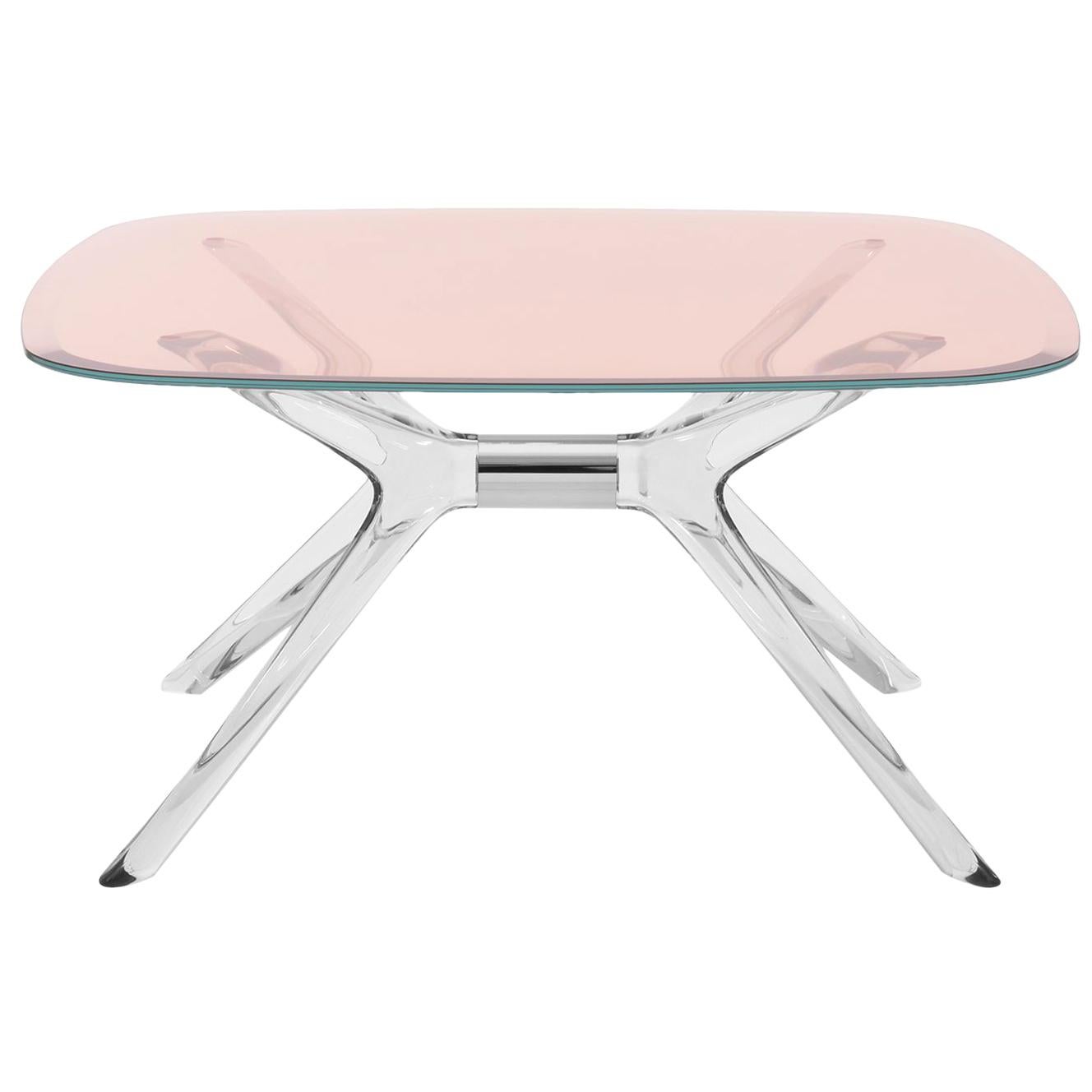 Table basse carrée Kartell Blast avec plateau rose de Philippe Starck