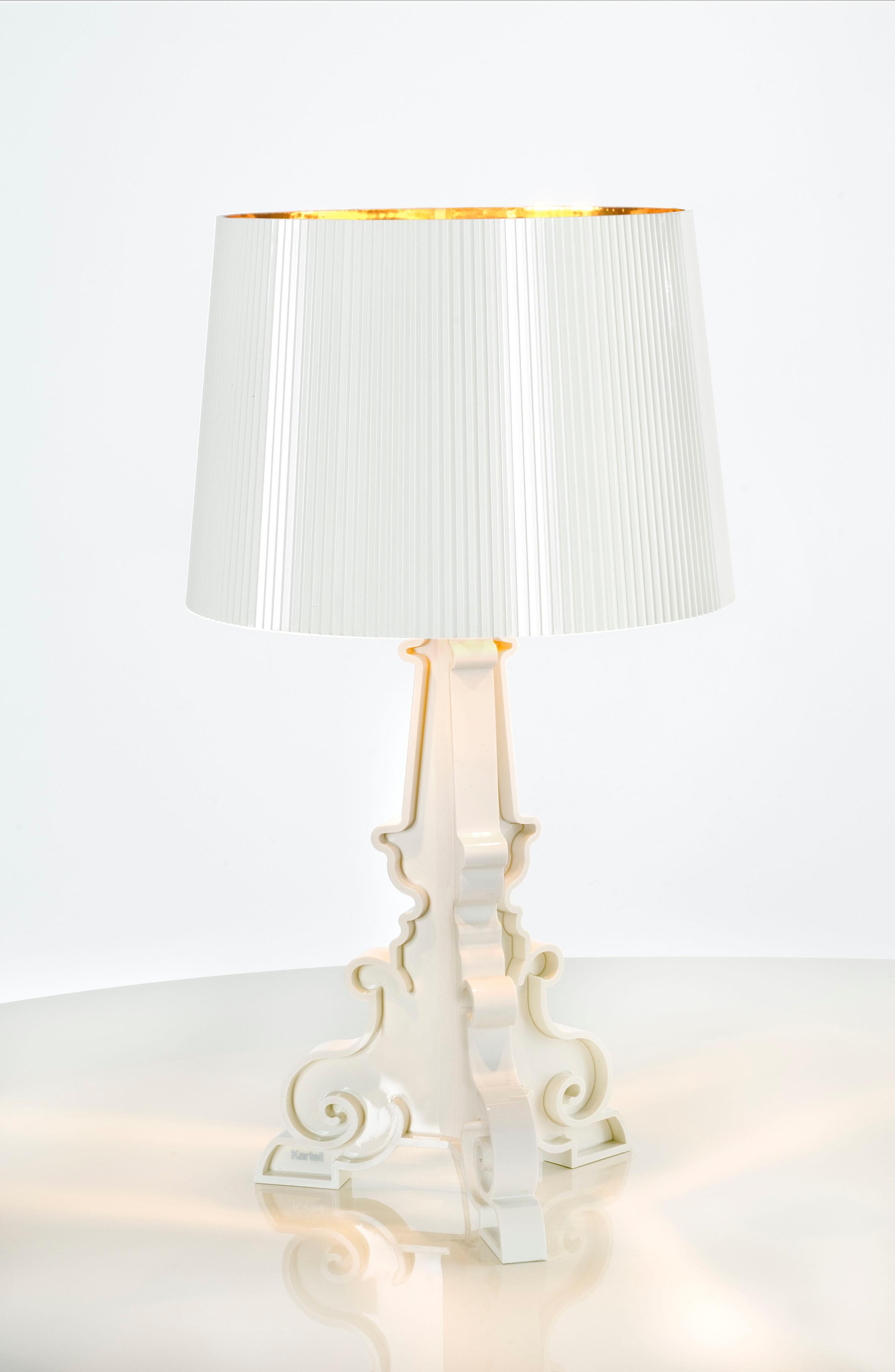 A lamp with an inimitable style, Bourgie is one of Kartell’s best sellers, skillfully combining Classic style, richness and tradition with innovation and irony. The Baroque style base is composed of three interconnecting decorated layers, while the