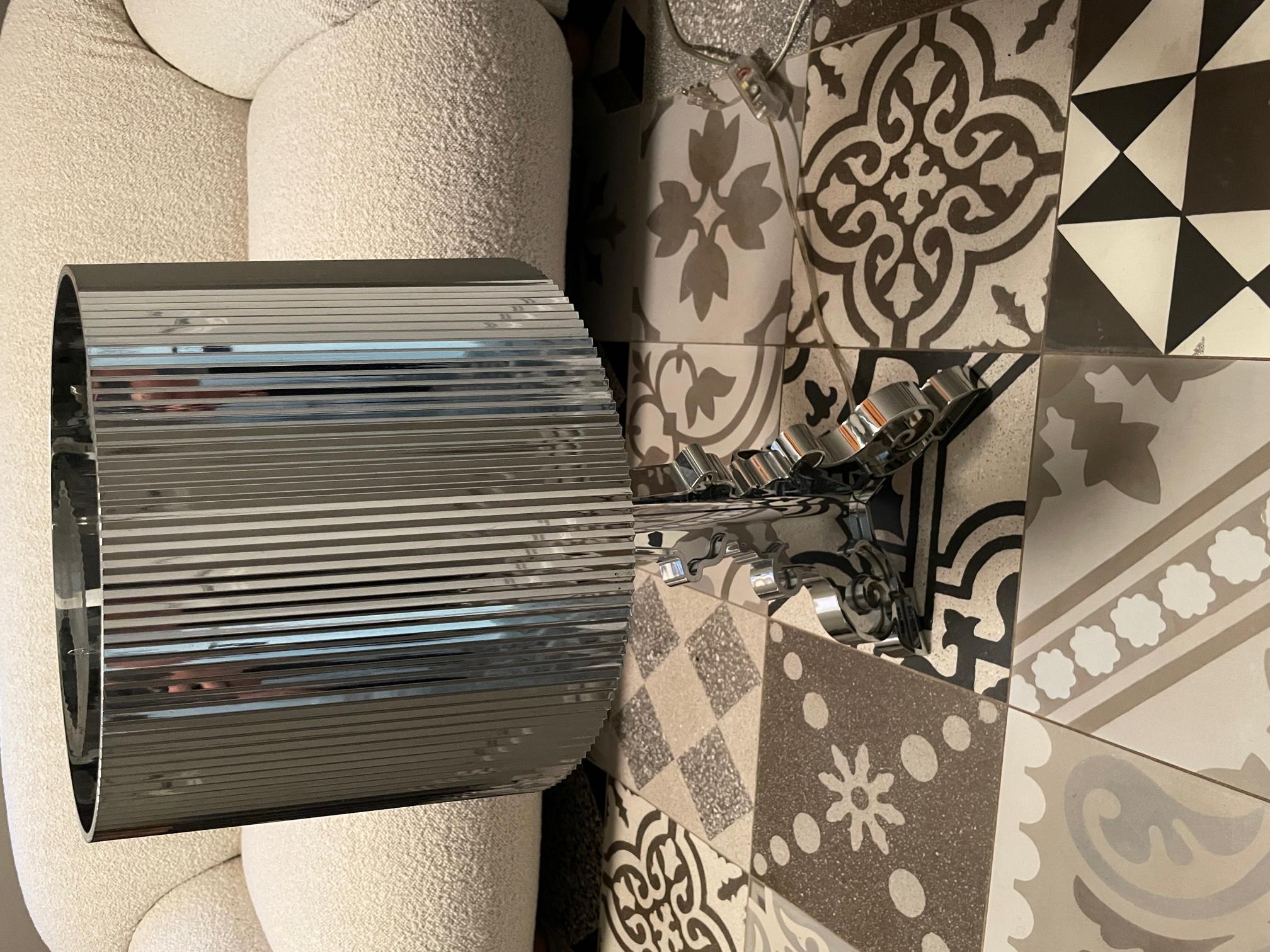 The Kartell Bourgie Table Lamp is a Kartell favorite due to designer Ferruccio Laviani's ability to combine a classic Baroque form with decidedly 21st century polycarbonate construction. The resulting statement piece is at once elegant and ironic.