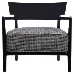 Chaise Kartell noire et beige de Philippe Starck avec Sergio Schito