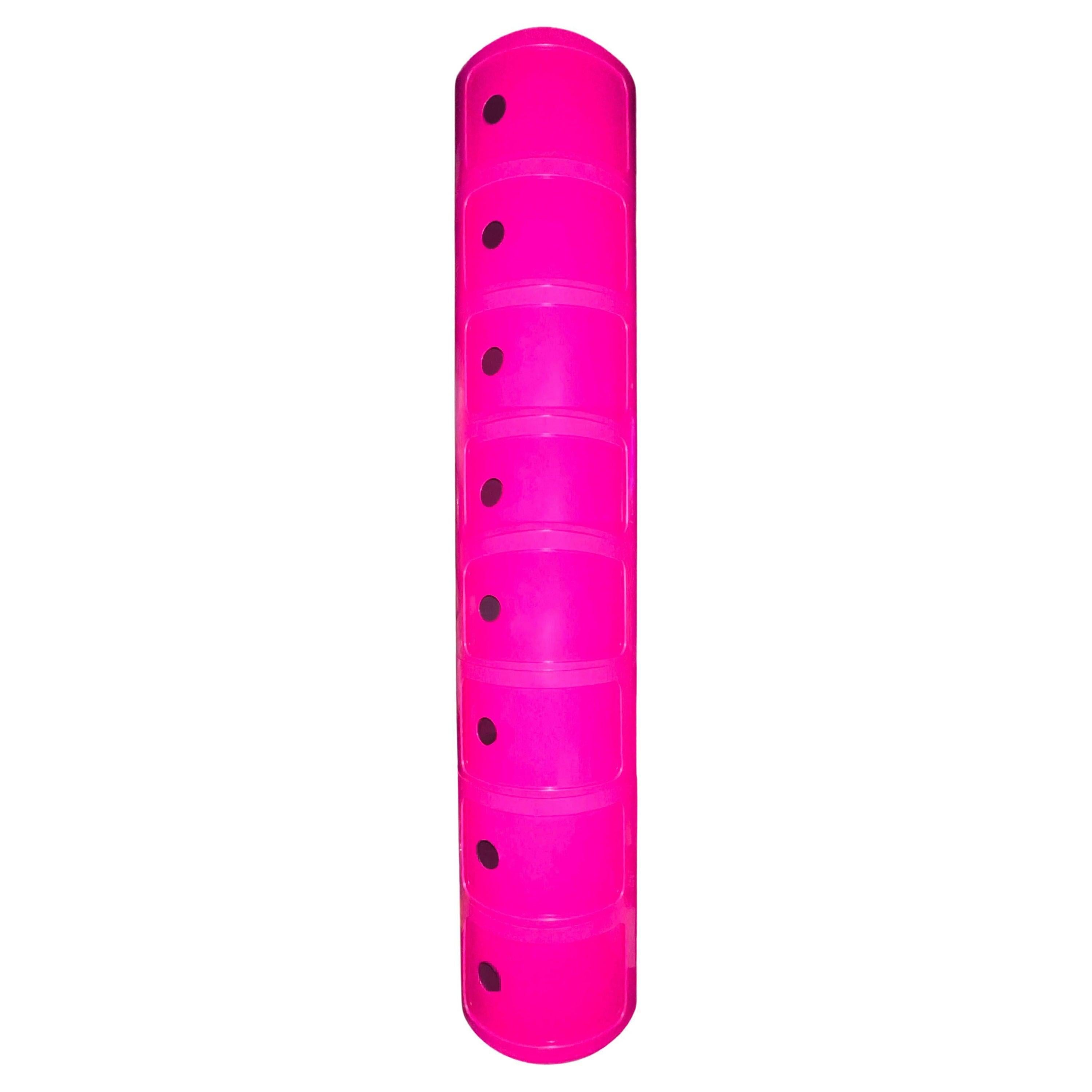 Rare Componibili storage unit components in vibrant hot pink. Shown as 8-tier in main photos. Will come with 8 “body” units and 4 “tops” so that you can arrange in many different ways. 
The Componibili Storage Unit (1969) takes its name from