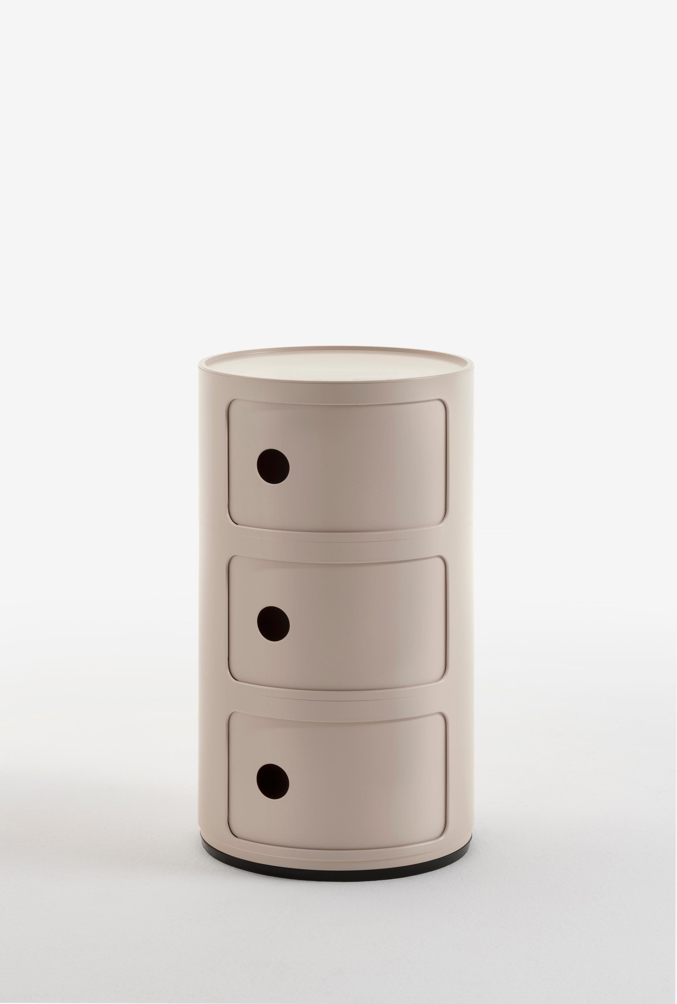 Componibili Bio in Cream by Anna Castelli Ferrieri for Kartell. The Componibili Bio storage unit was first created by Italian designer and Kartell co-founder Anna Castelli Ferrieri in the 1960s. At the time of its origin, the Componibili Bio was
