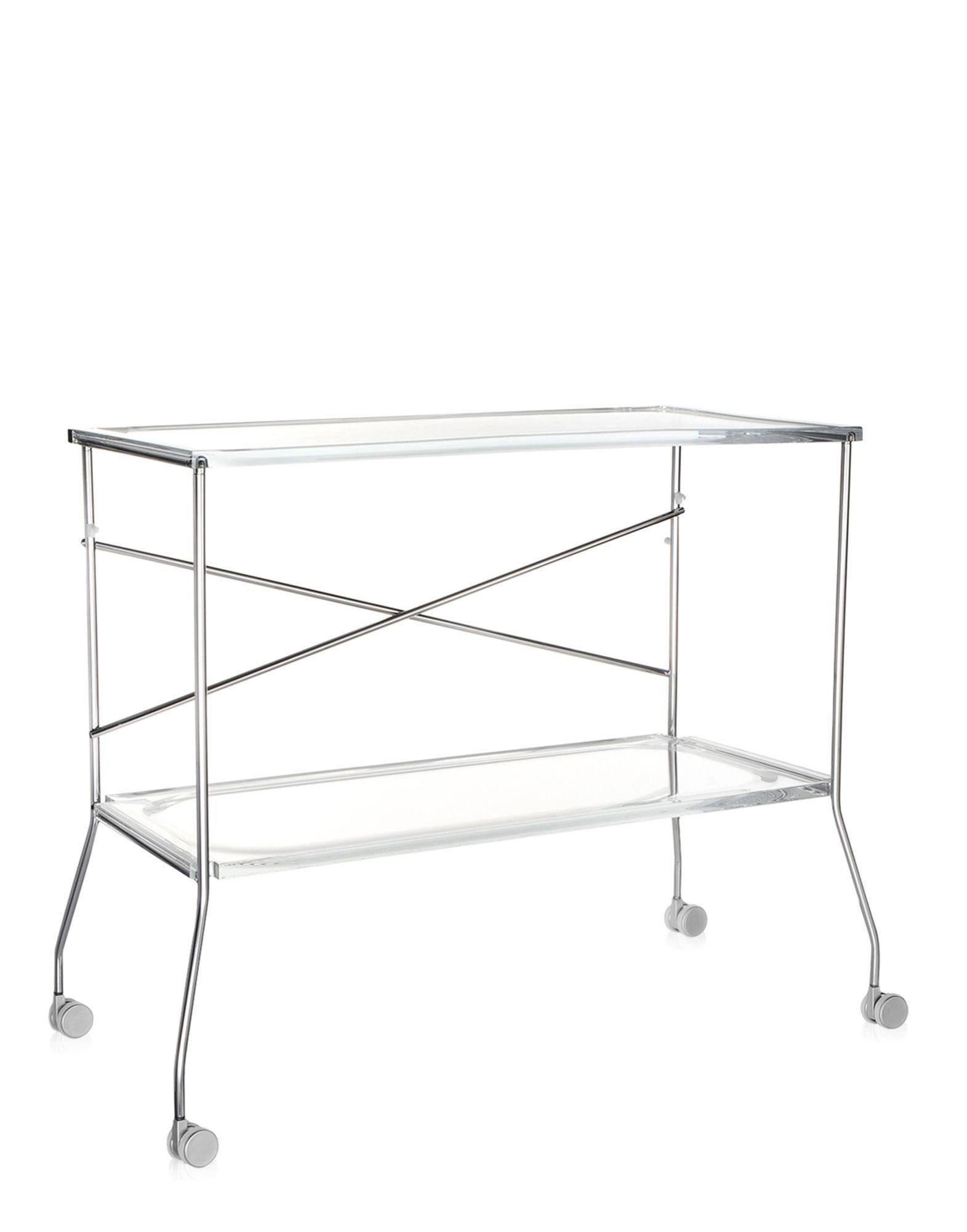 Kartell brings transparency to the world of trolleys too and thus we have flip, the folding trolley which combines the transparent plastic surfaces of the trays with a metal frame. The trays made of polymethylmethacrylate and can be used separately.
