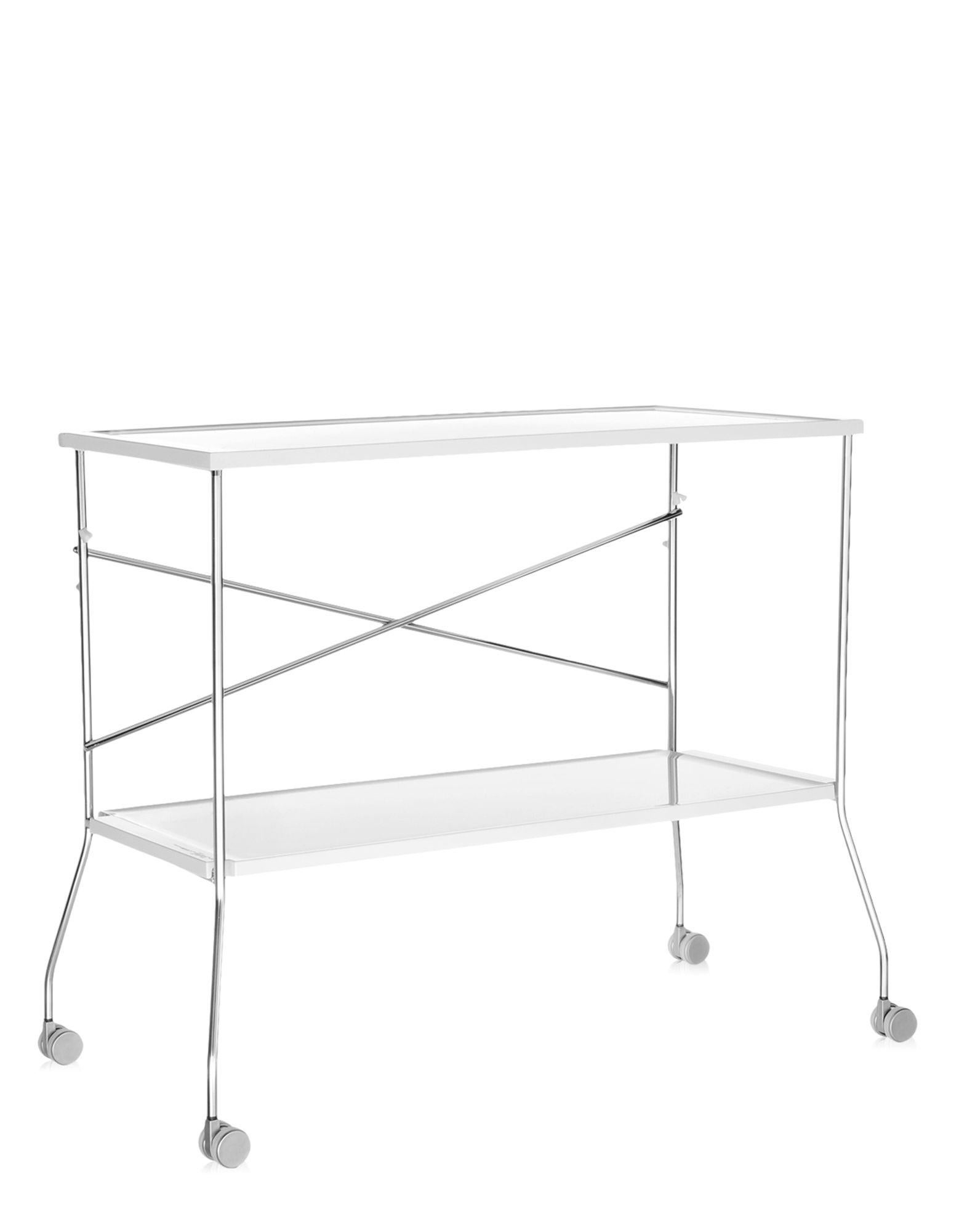 Kartell brings transparency to the world of trolleys too and thus we have flip, the folding trolley which combines the transparent plastic surfaces of the trays with a metal frame. The trays made of polymethylmethacrylate and can be used separately.