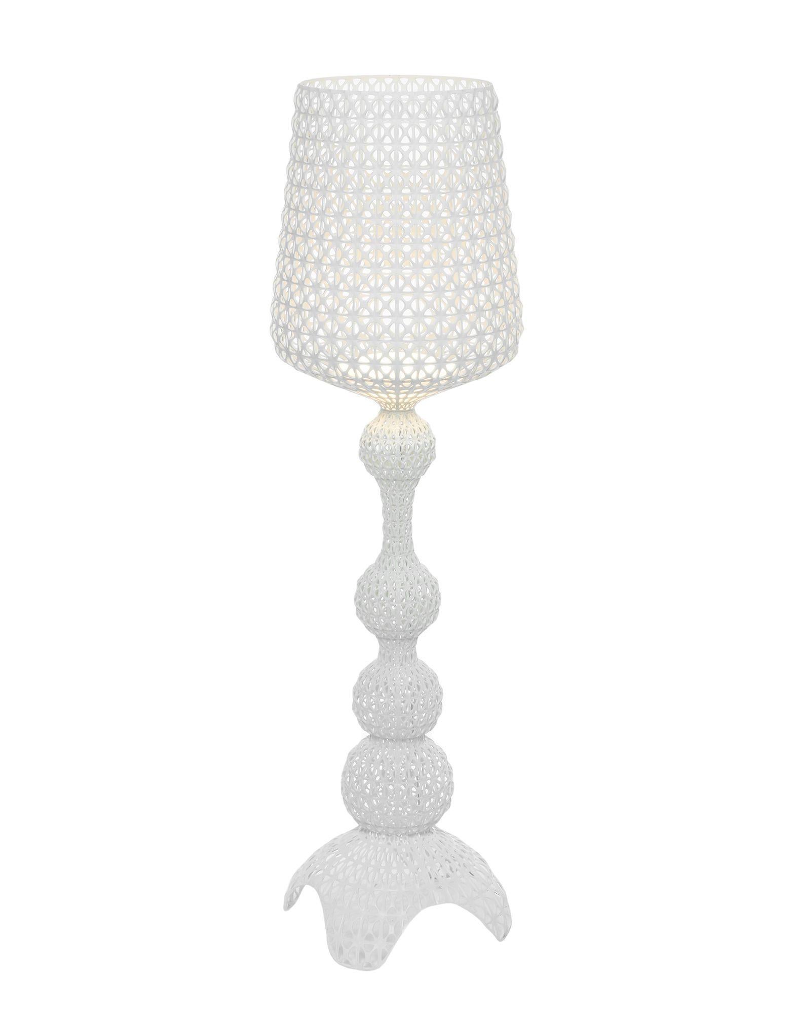 The Kabuki floor lamp is injection molded. The sophisticated injection technology used makes it possible to crate a woven structure similar to lace with a unique perforated surface through which the light is diffused.

Dimensions: Height 65.33