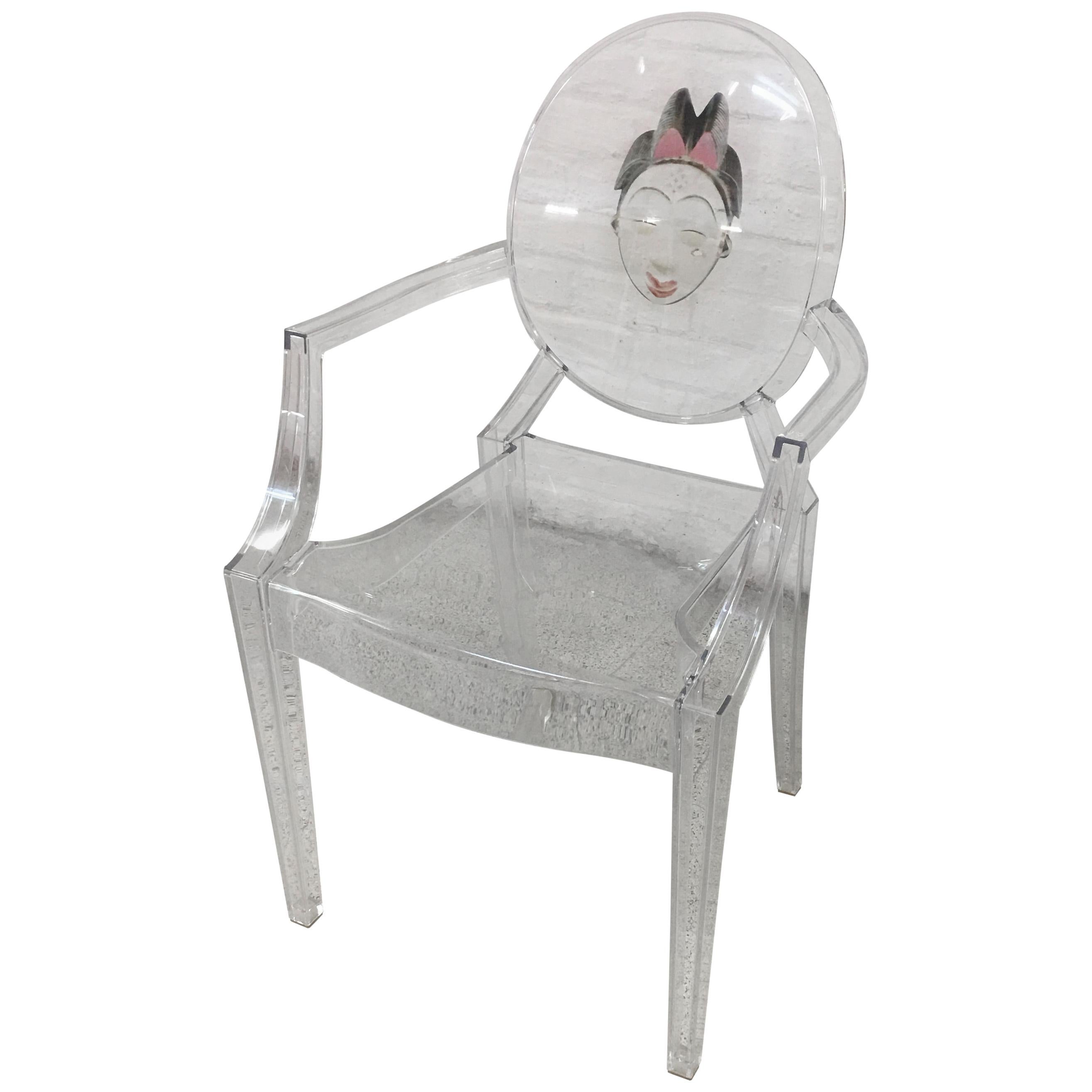 Fauteuil Louis Ghost de Kartell en cristal par Philippe Starck