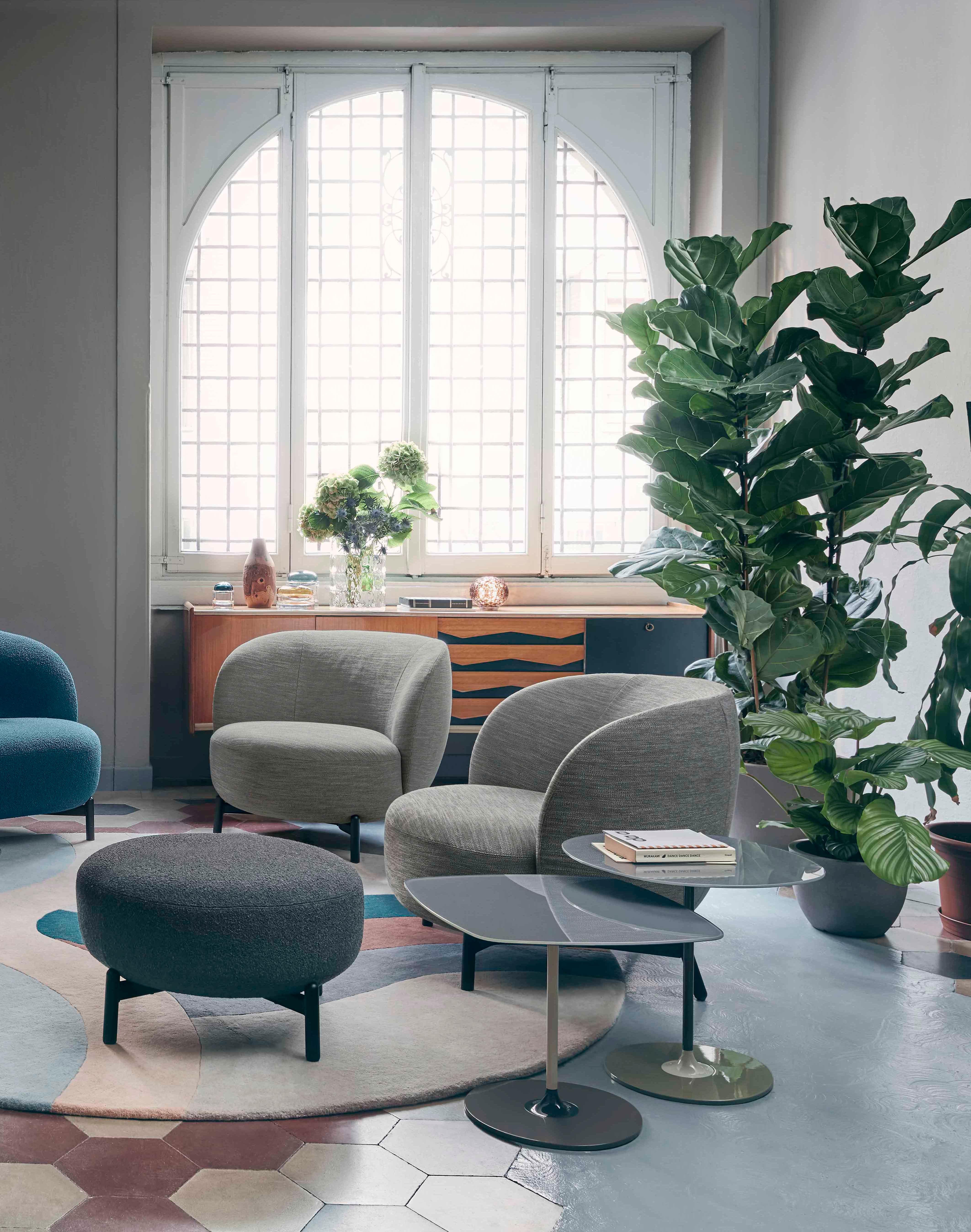 Lunam is an enchanting living space furniture collection inspired by the dreamy atmosphere of a lunar landscape. An essential, painted metal structure supports generously dimensioned upholstered sections. 
sofa, armchair and pouffe come in soft