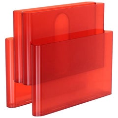 Porte-revues Kartell rouge orange par Giotto Stoppino