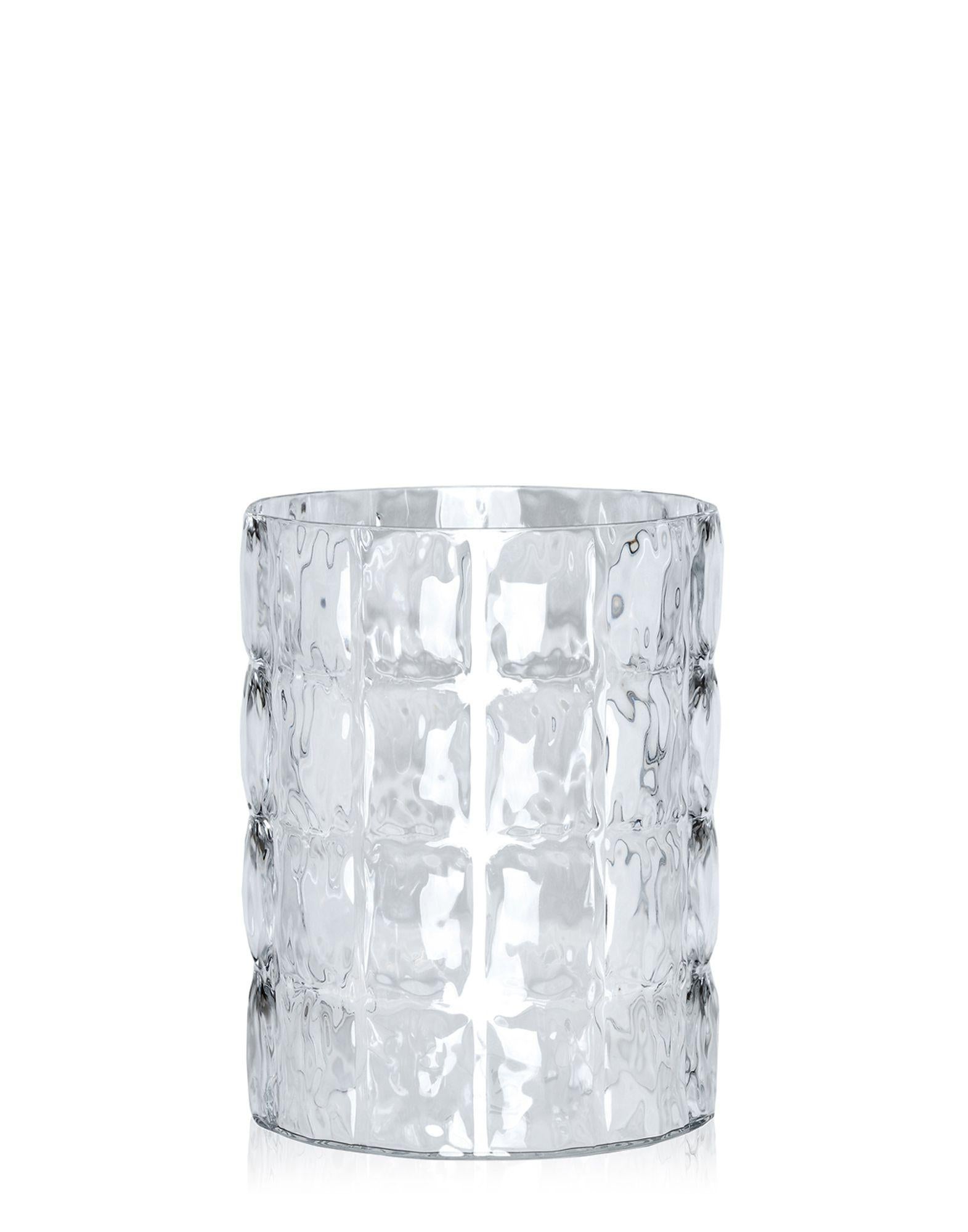 The distinctive feature and special allure of these original vases lie in their particular conformation, suggestive of a wafed fabric with irregular sinuosities caused by the different surface thicknesses.

Available in Crystal, Amber, Glossy